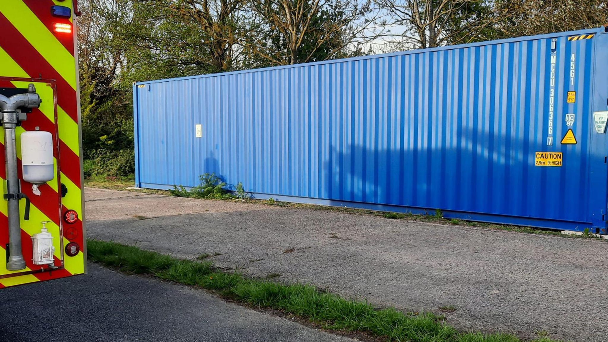 A container and fire engine