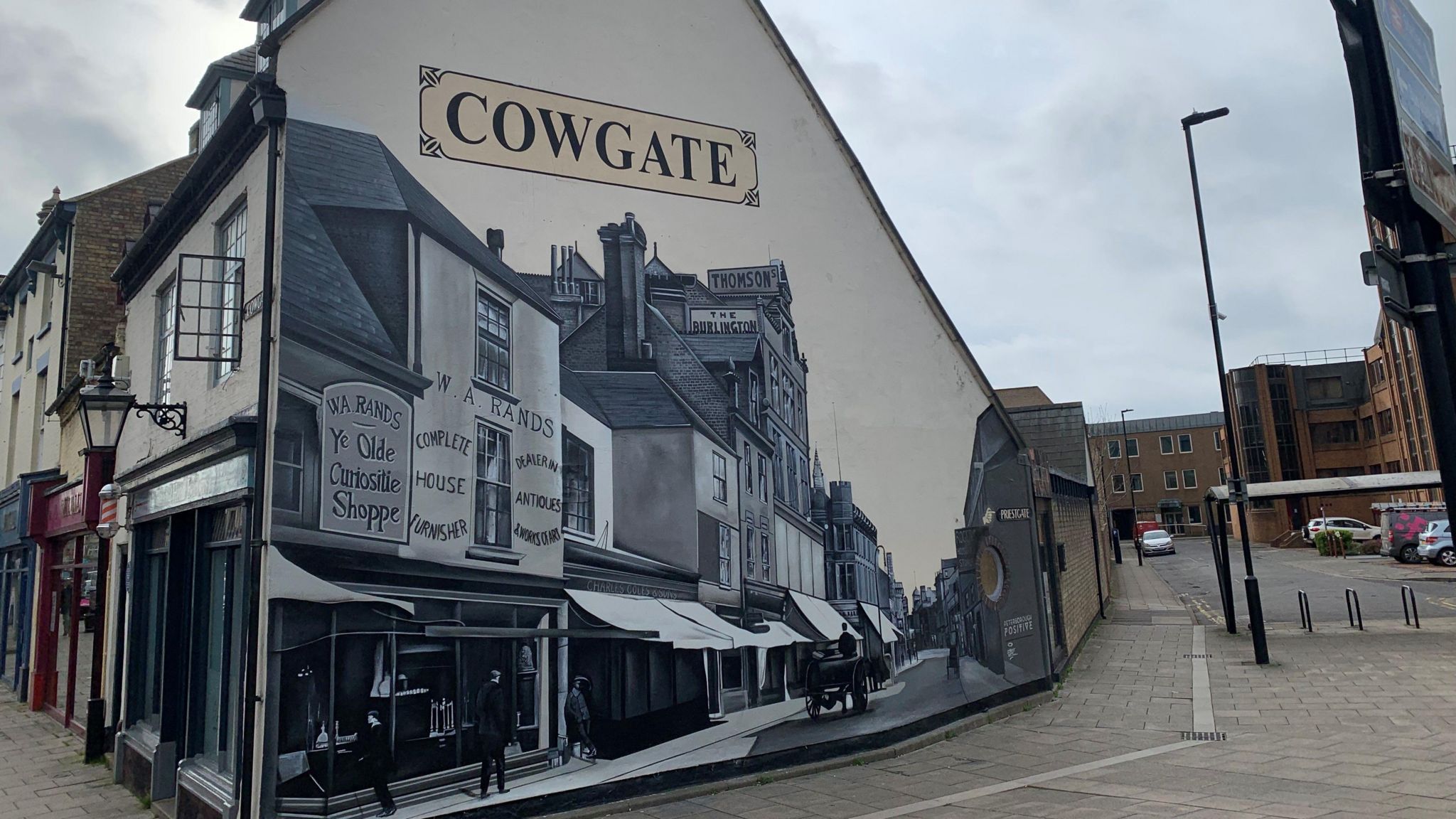 The historic Cowgate mural painted black and white