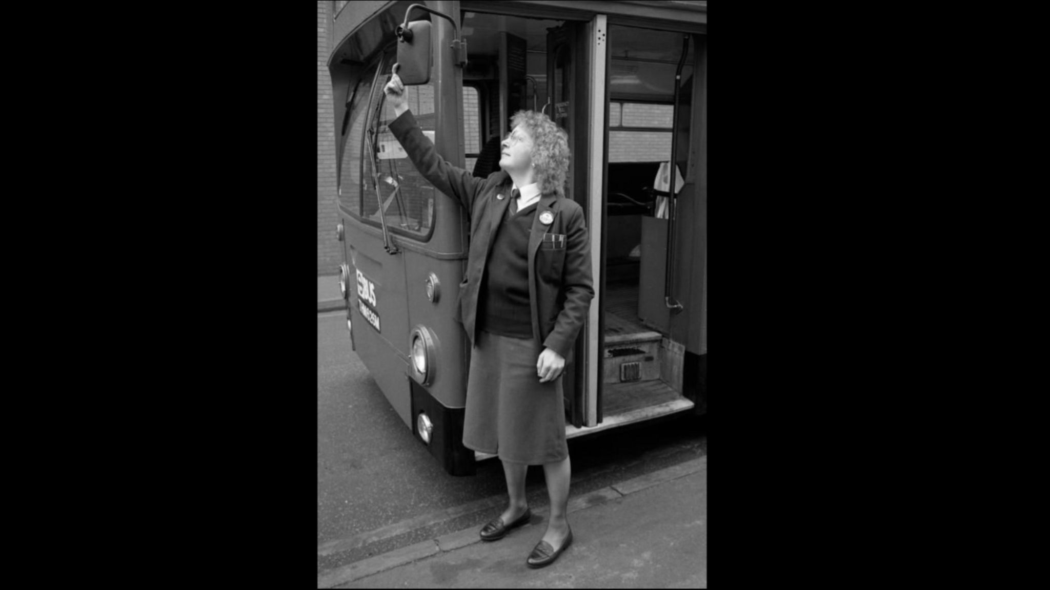Jill checks the bus at the start of her shift