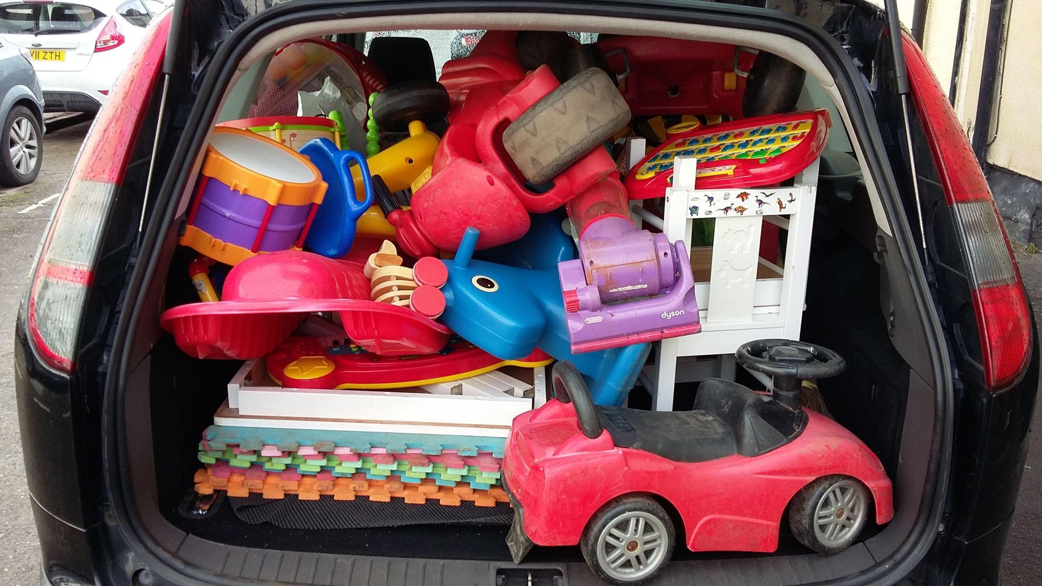 Toys packed into boot