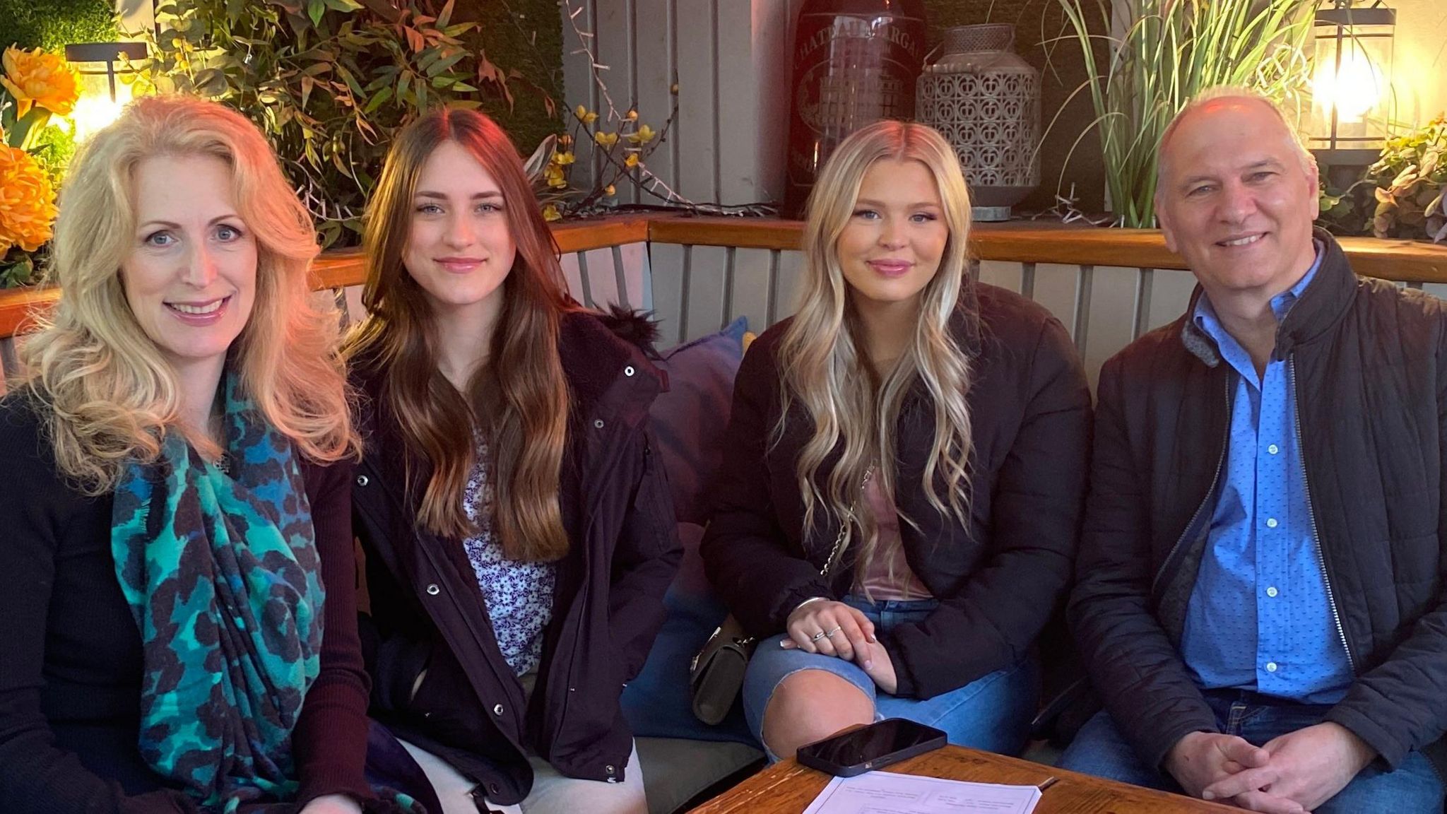 Suzanne, Annie, Isla and Ian Hollinshead, sitting down, looking straight to camera 