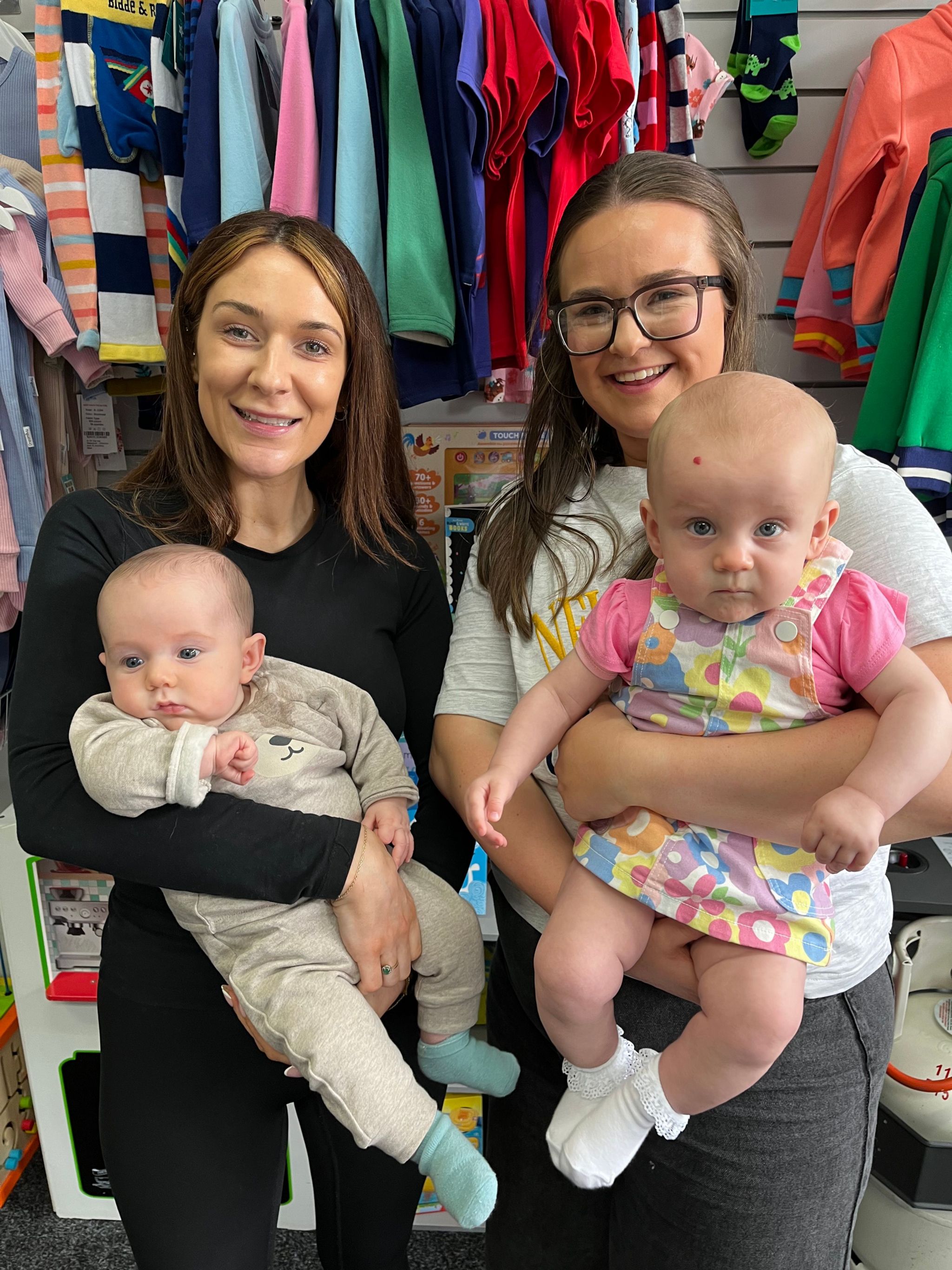Molly Mulhearn and Holly McPhee hold their babies