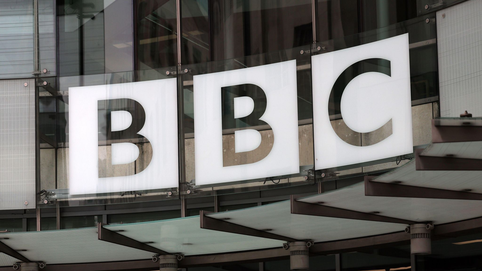 The BBC logo at the entrance of Broadcasting House in London