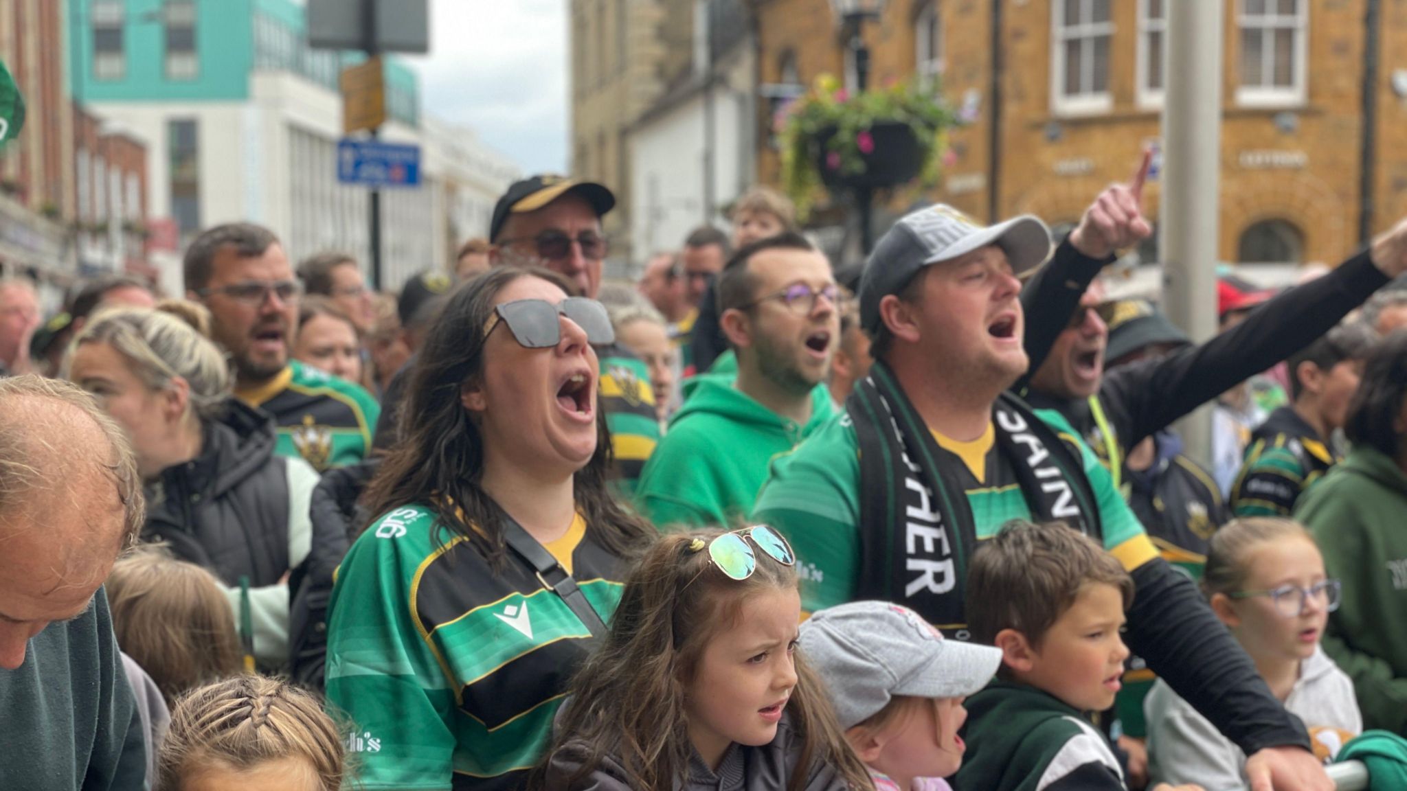 Fans cheering during the Northampton Saints celebratory parade