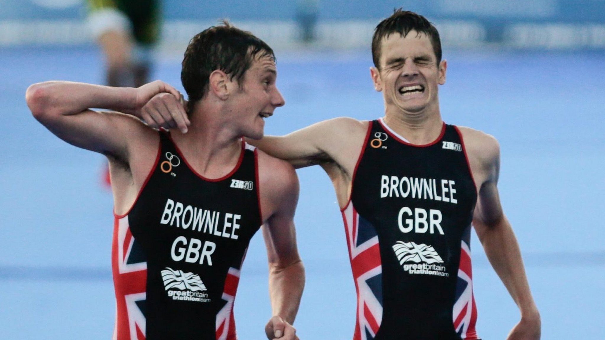 Jonny Brownlee is helped over the finish line by brother Alistair
