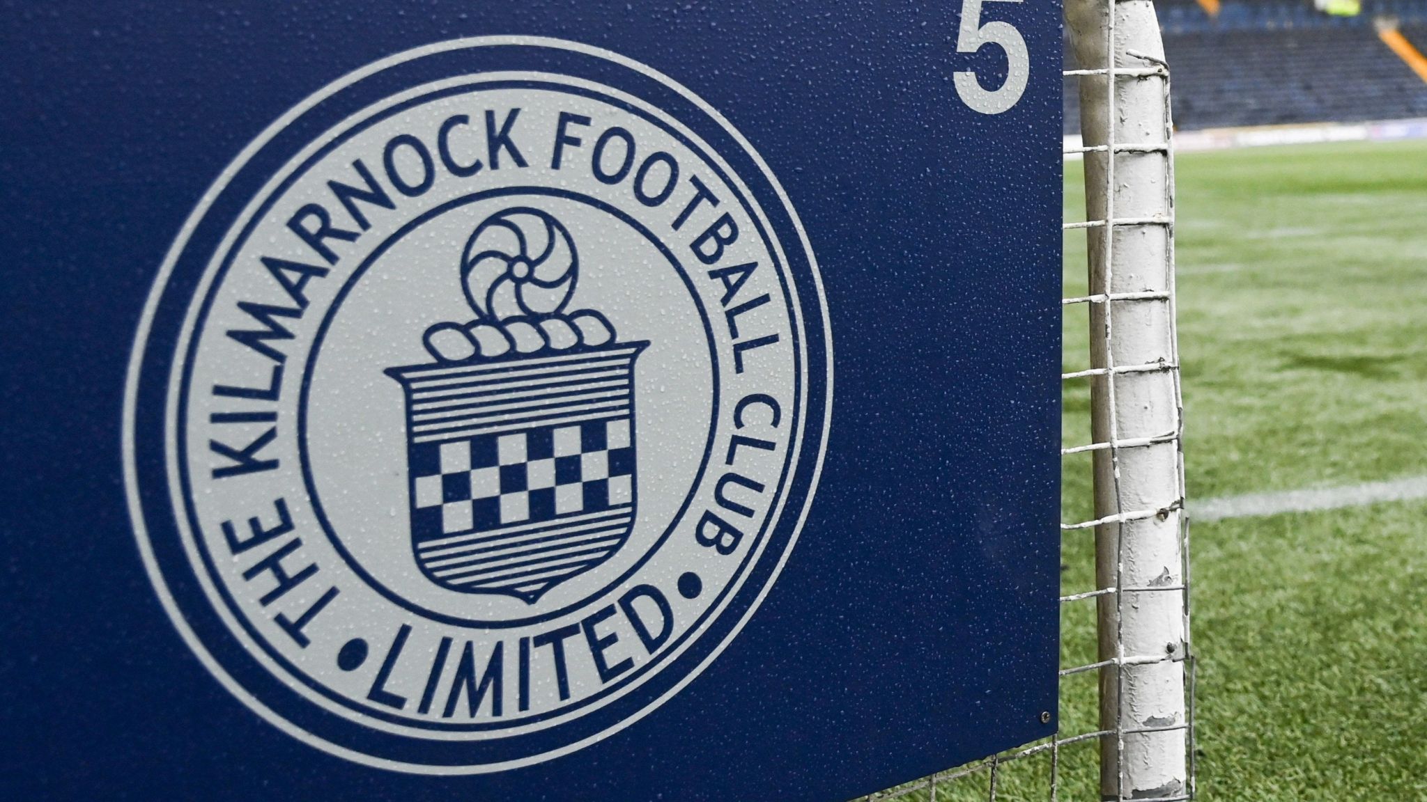 Kilmarnock badge on fence