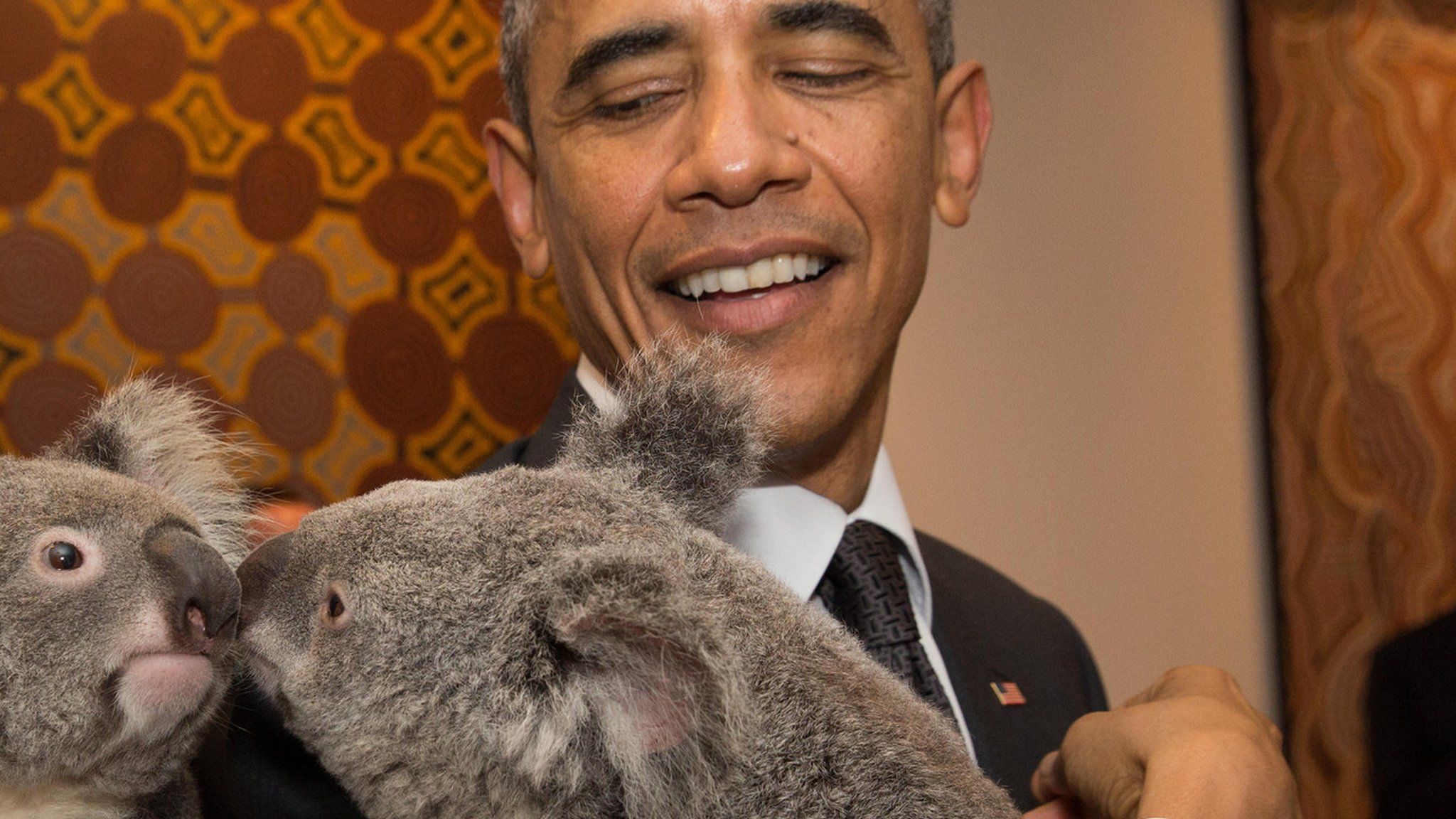 President Obama holding a koala