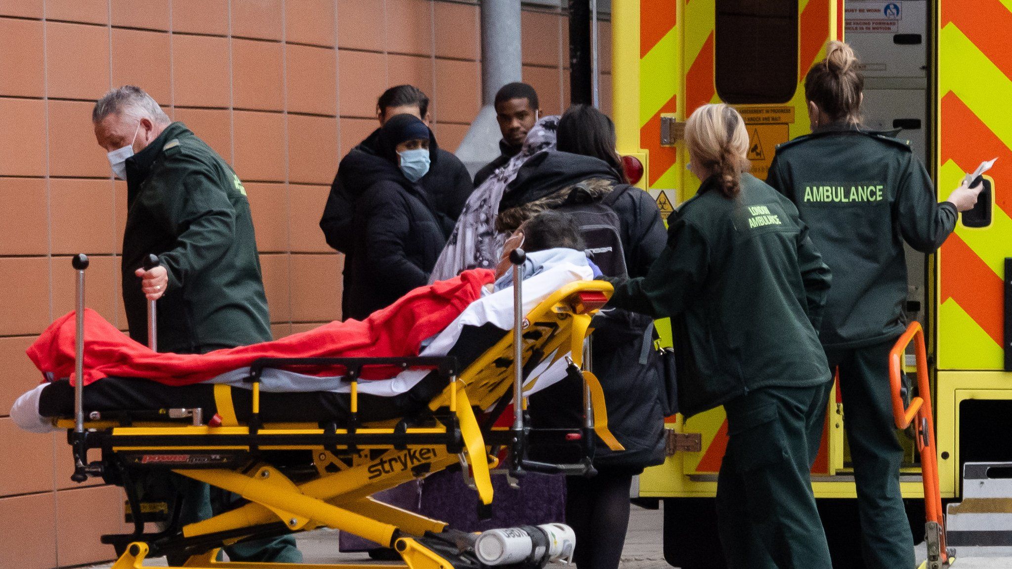 Paramedics take patient into hospital