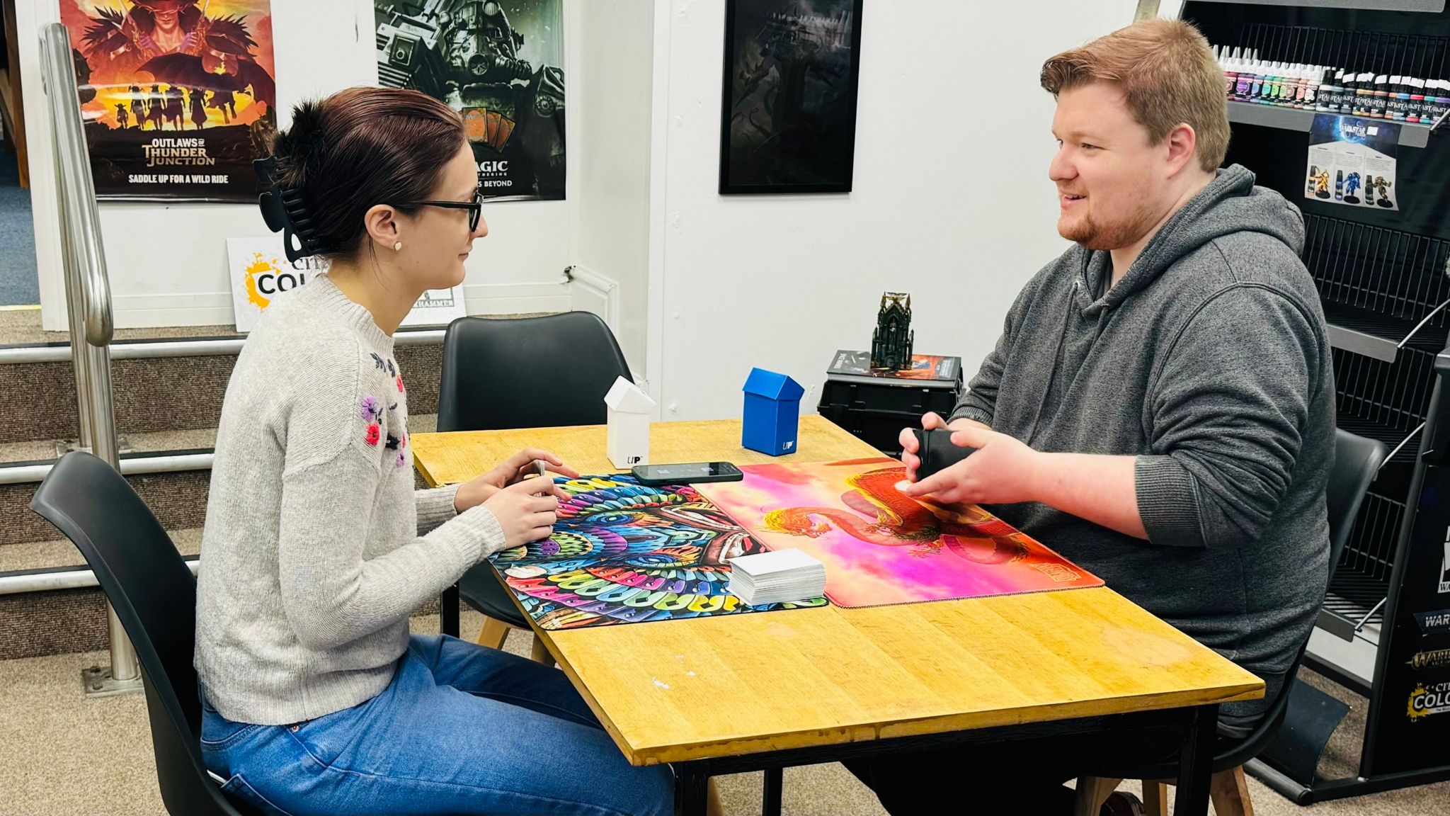 Hearthside Games owner Josh Hill playing a game