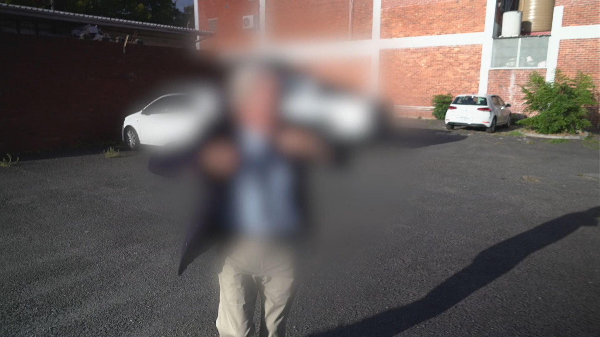 Accused teacher, blurred shot