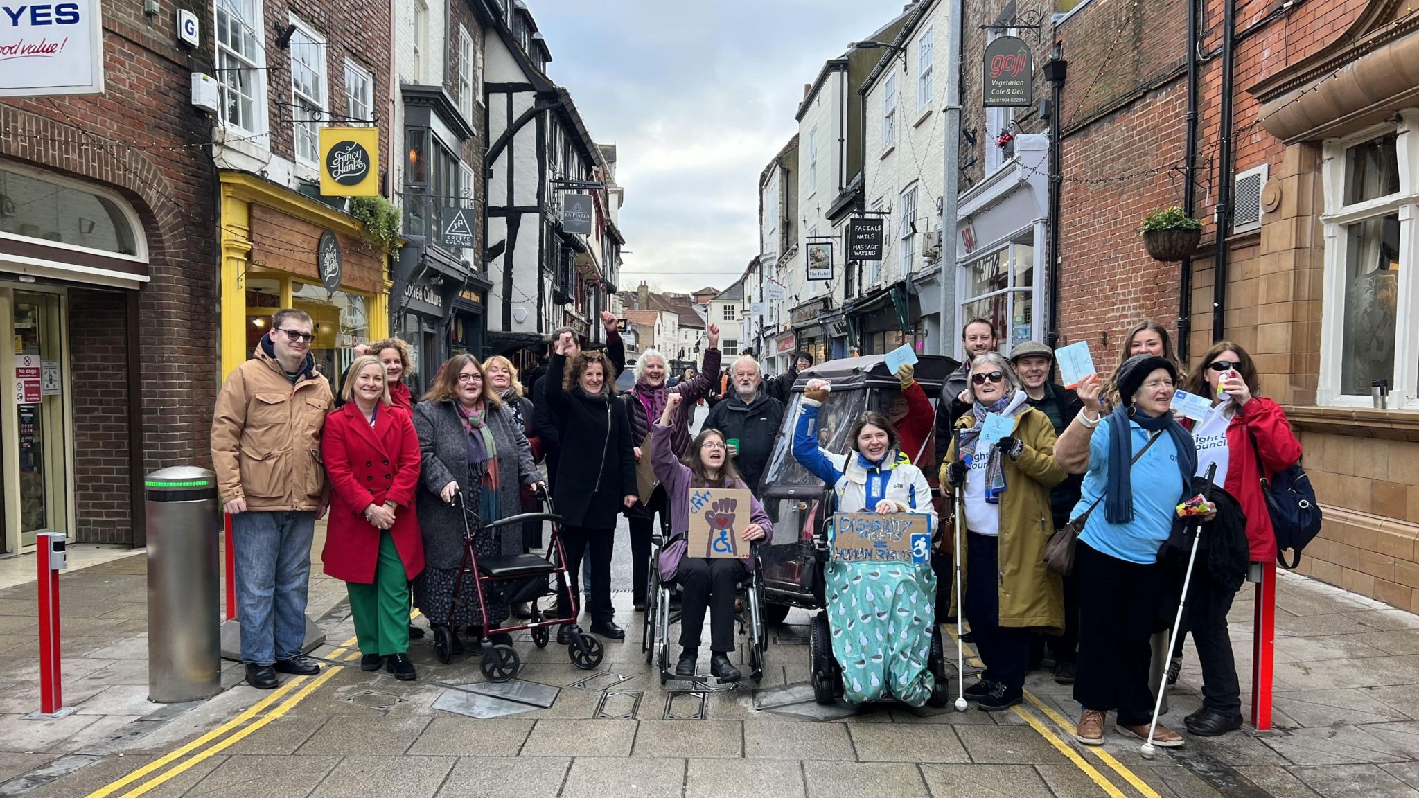 Disabled campaigners in York celebrate the lifting of the blue badge ban
