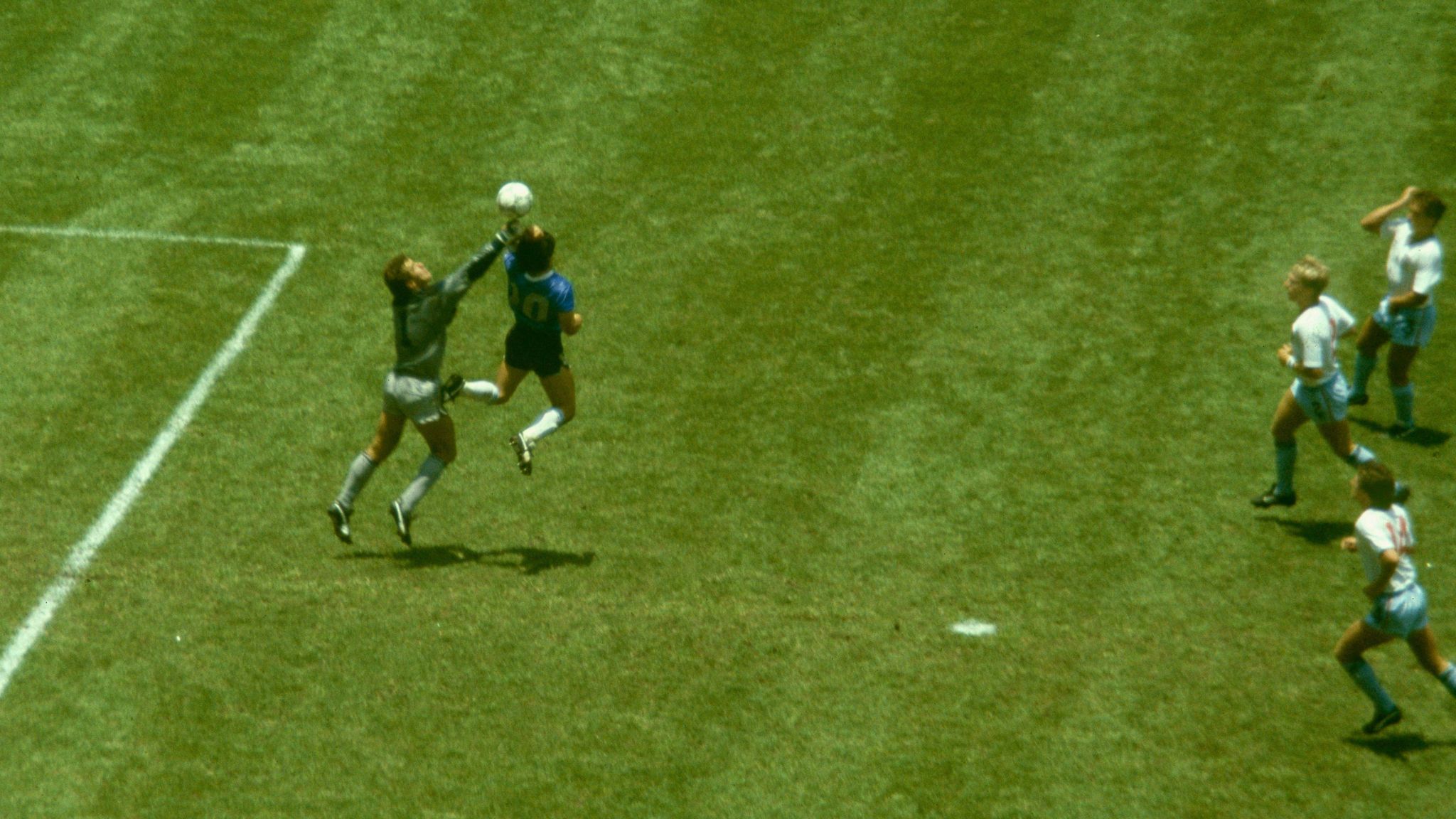 Diego Maradona scores his 'Hand of God' goal for Argentina against England at the 1986 World Cup