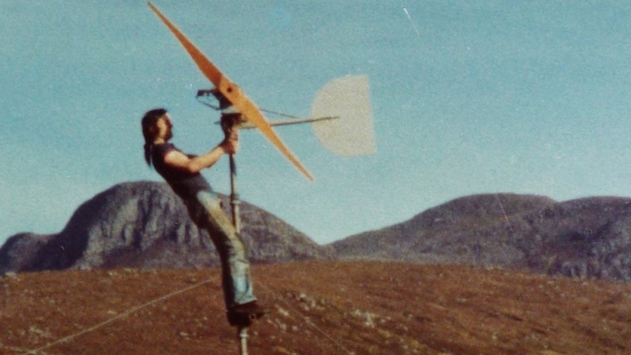 Hugh Piggott and a wind turbine at Scoraig in the 1980s