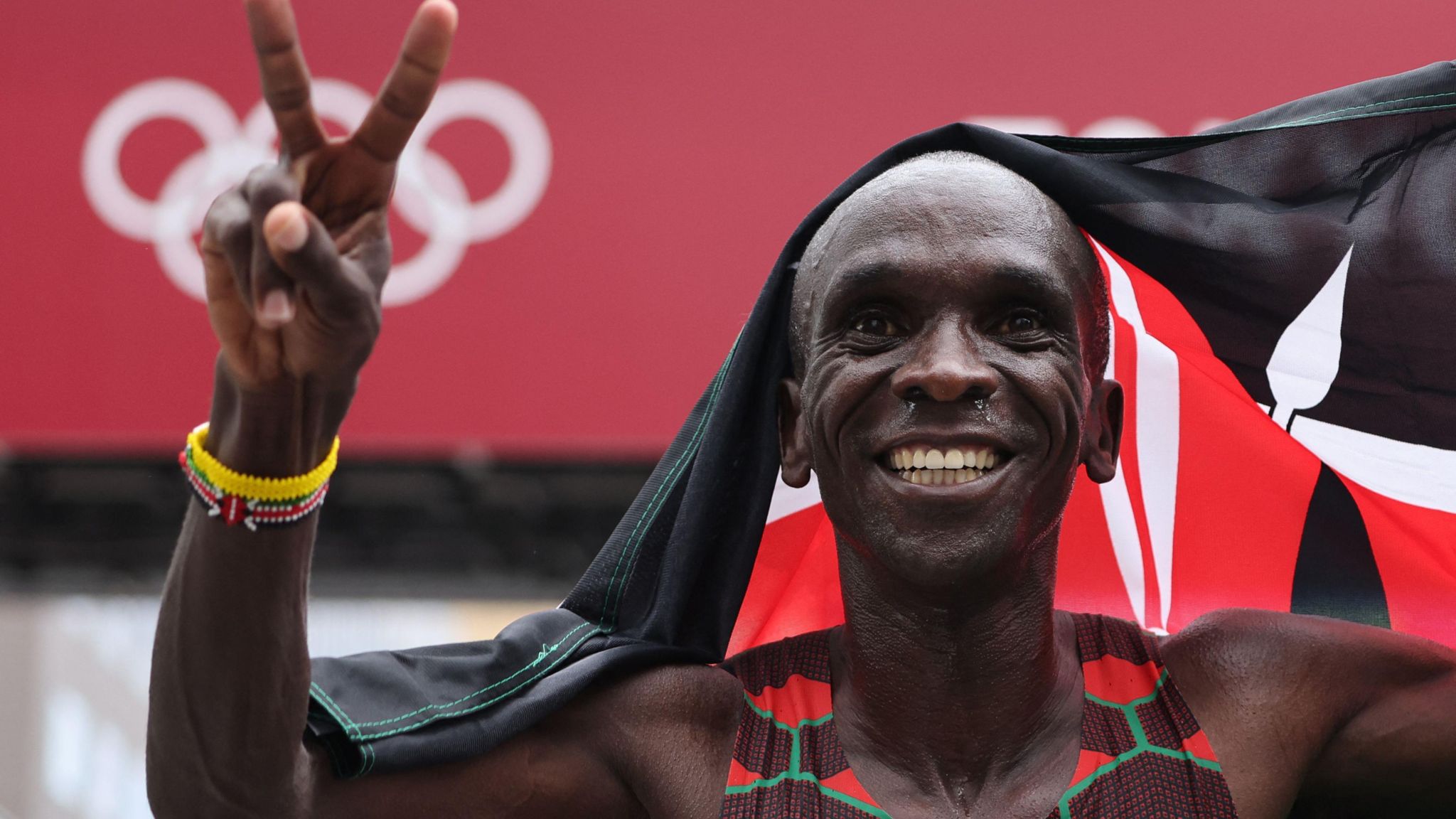 Eliud Kipchoge celebrates winning the men's marathon at the 2020 Tokyo Olympic Games