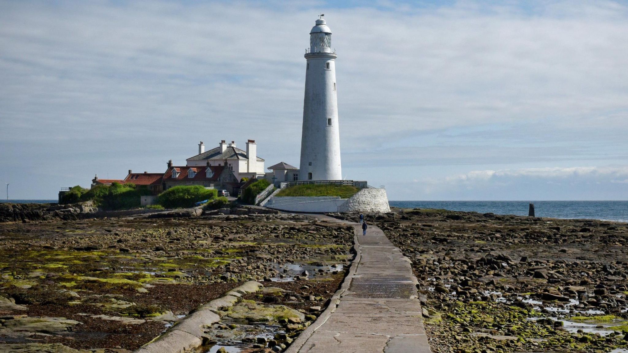 Looking over to Whitley Bay's St Mary's Lighthouse while the tide is out on a sunny day