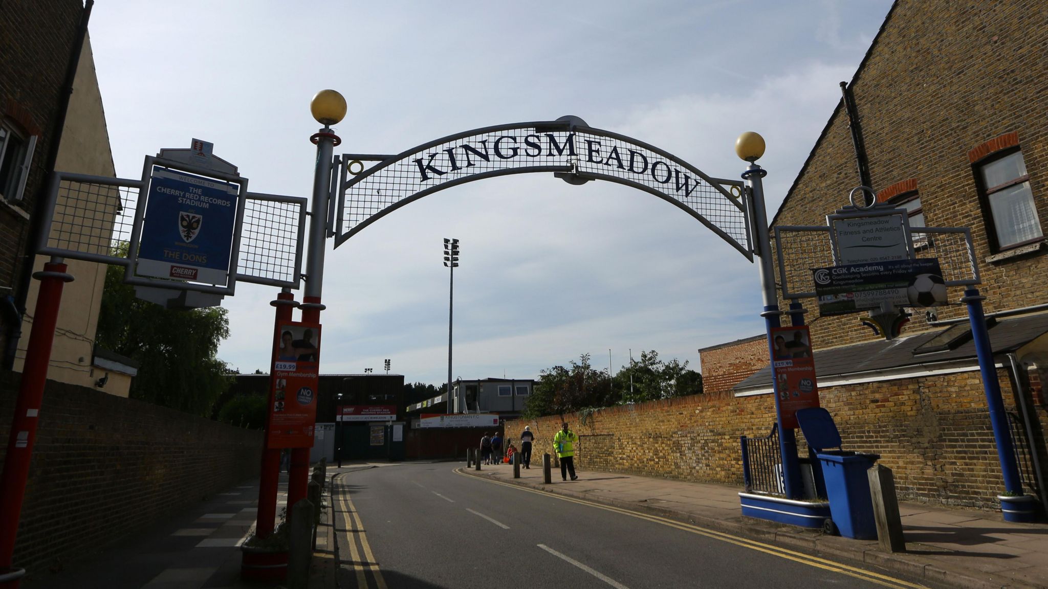 A general view of an arch over the road read Kingsmeadow with the stadium in the background