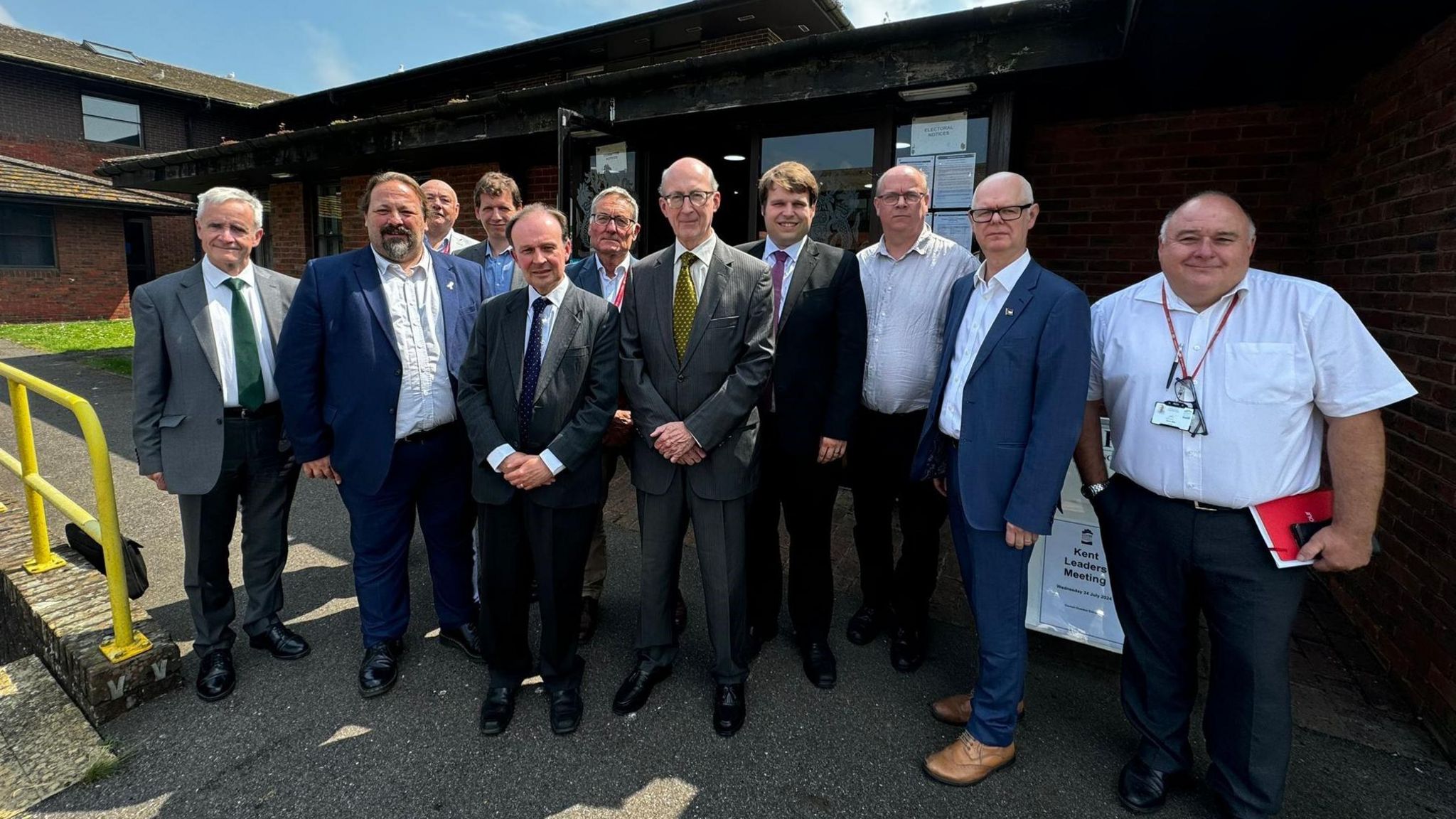 Kent council leaders outside a meeting in Dover