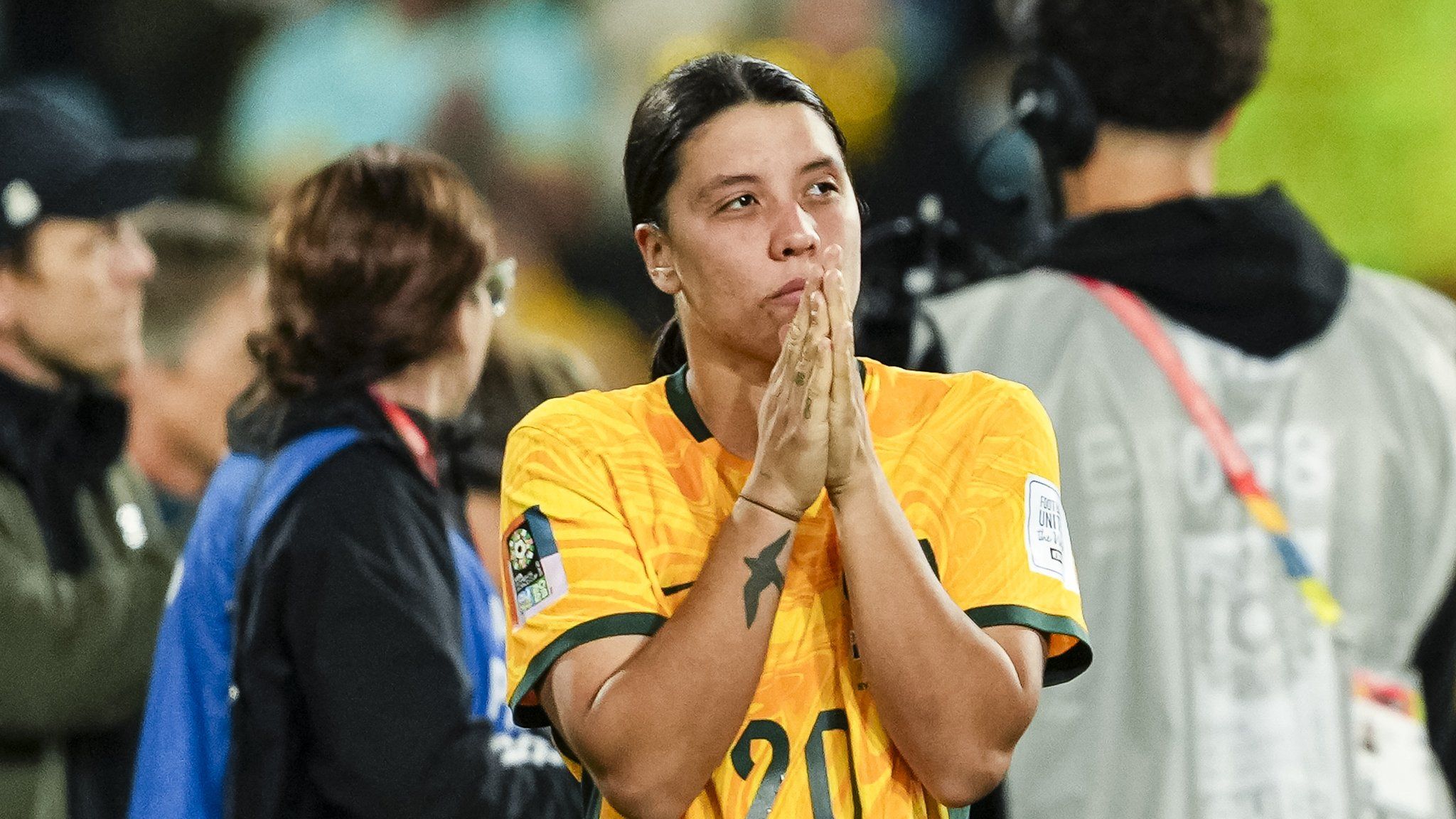 Sam Kerr looks dejected after semi-final loss