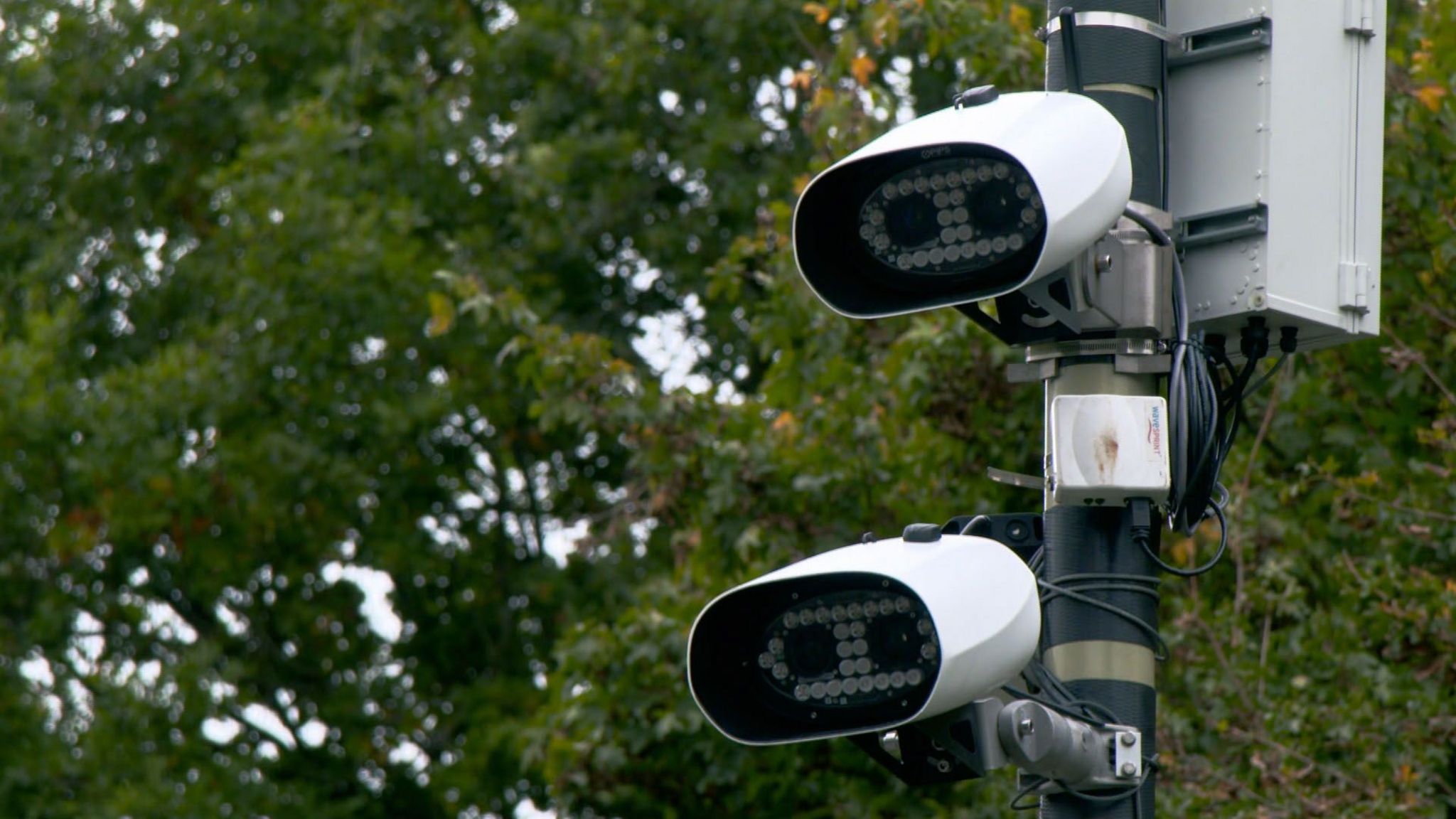 Two Automatic Number Plate Recognition cameras on a pole.