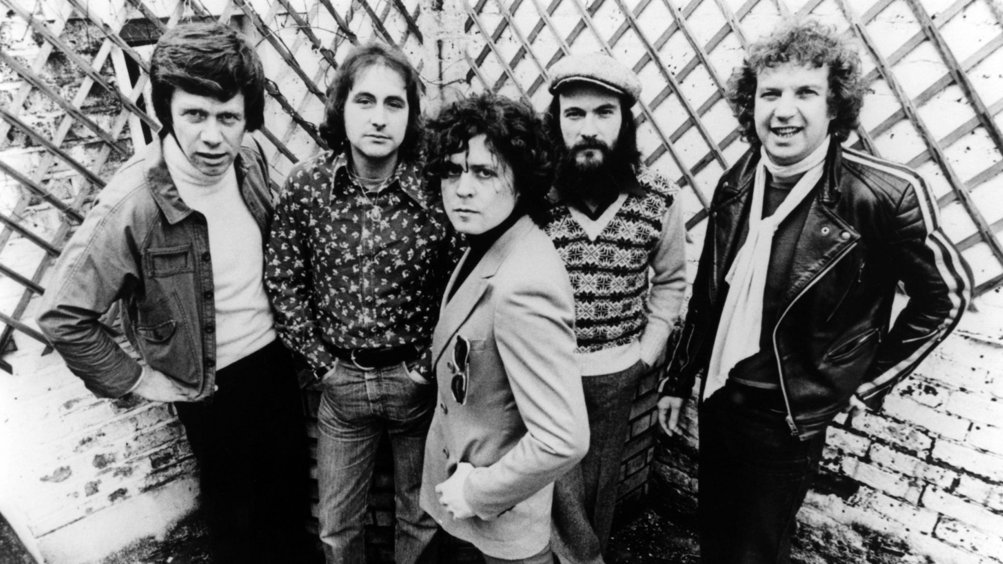 Black and white photo of the rock band T.Rex