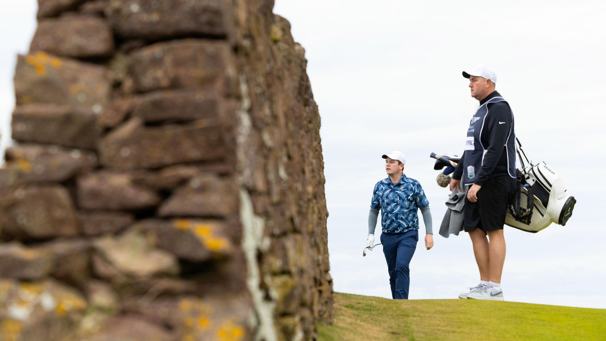 Bob MacIntyre got up and down from behind a wall to save par at the 12th