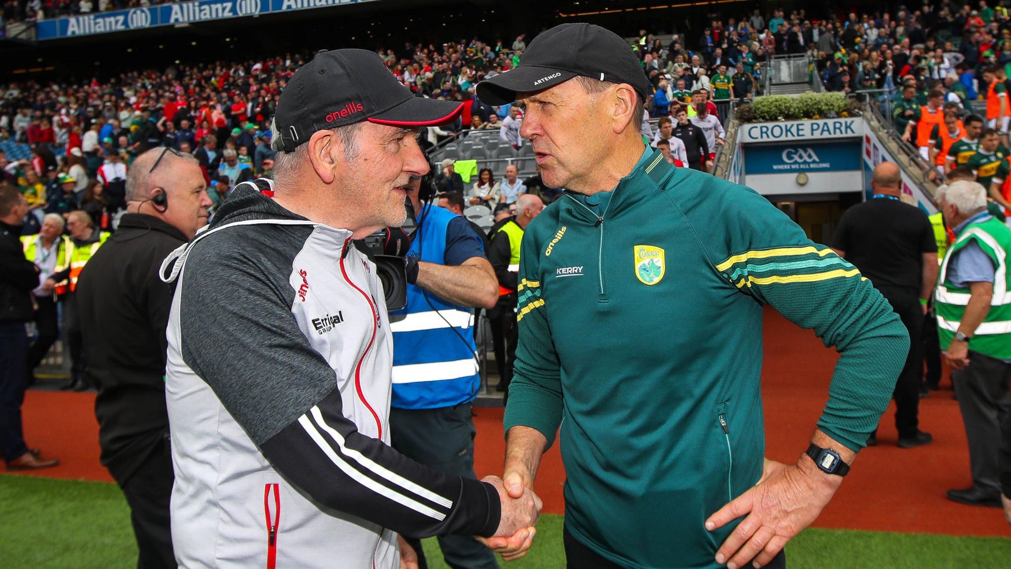Derry boss Mickey Harte congratulates Jack O'Connor on Kerry's win over Derry