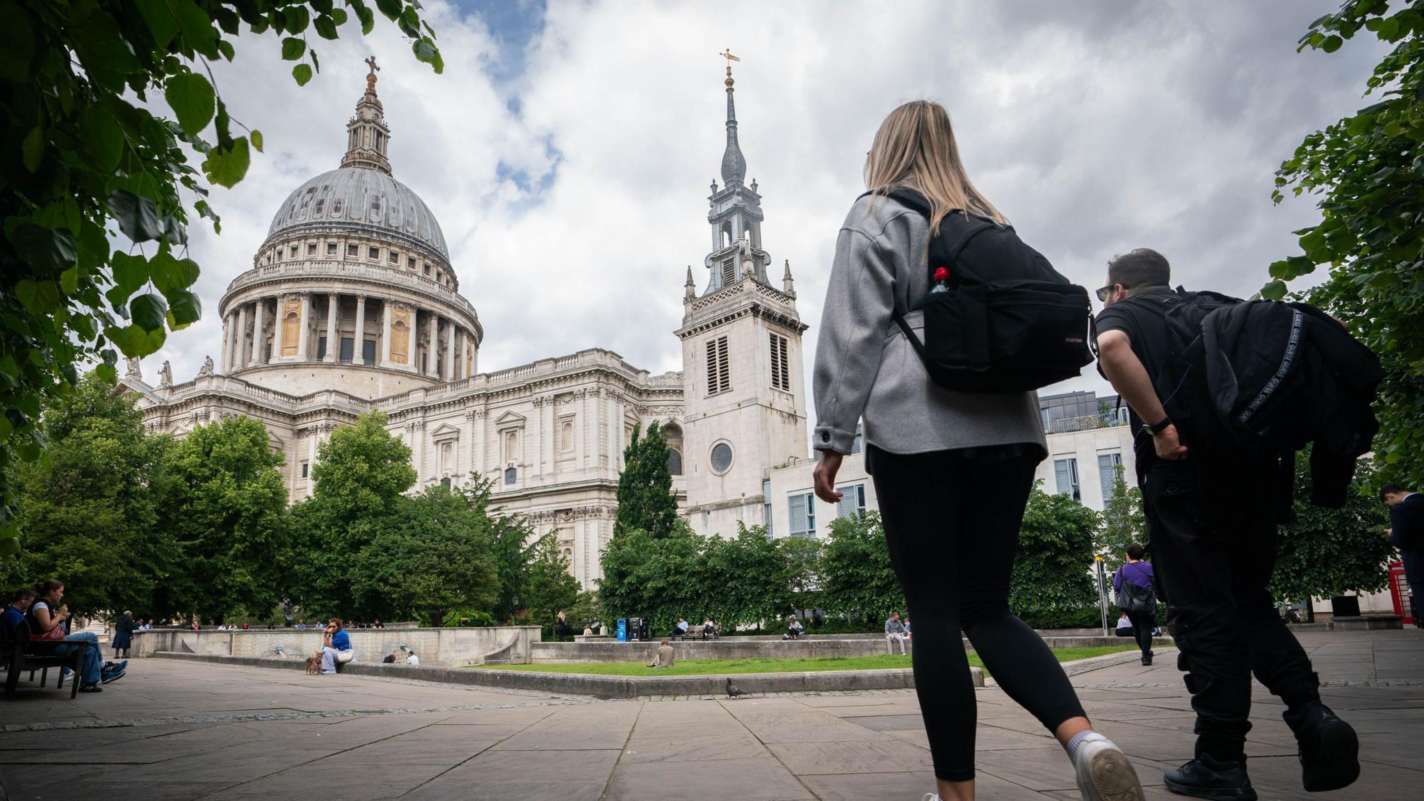 People walk near St Paul's Cathedral