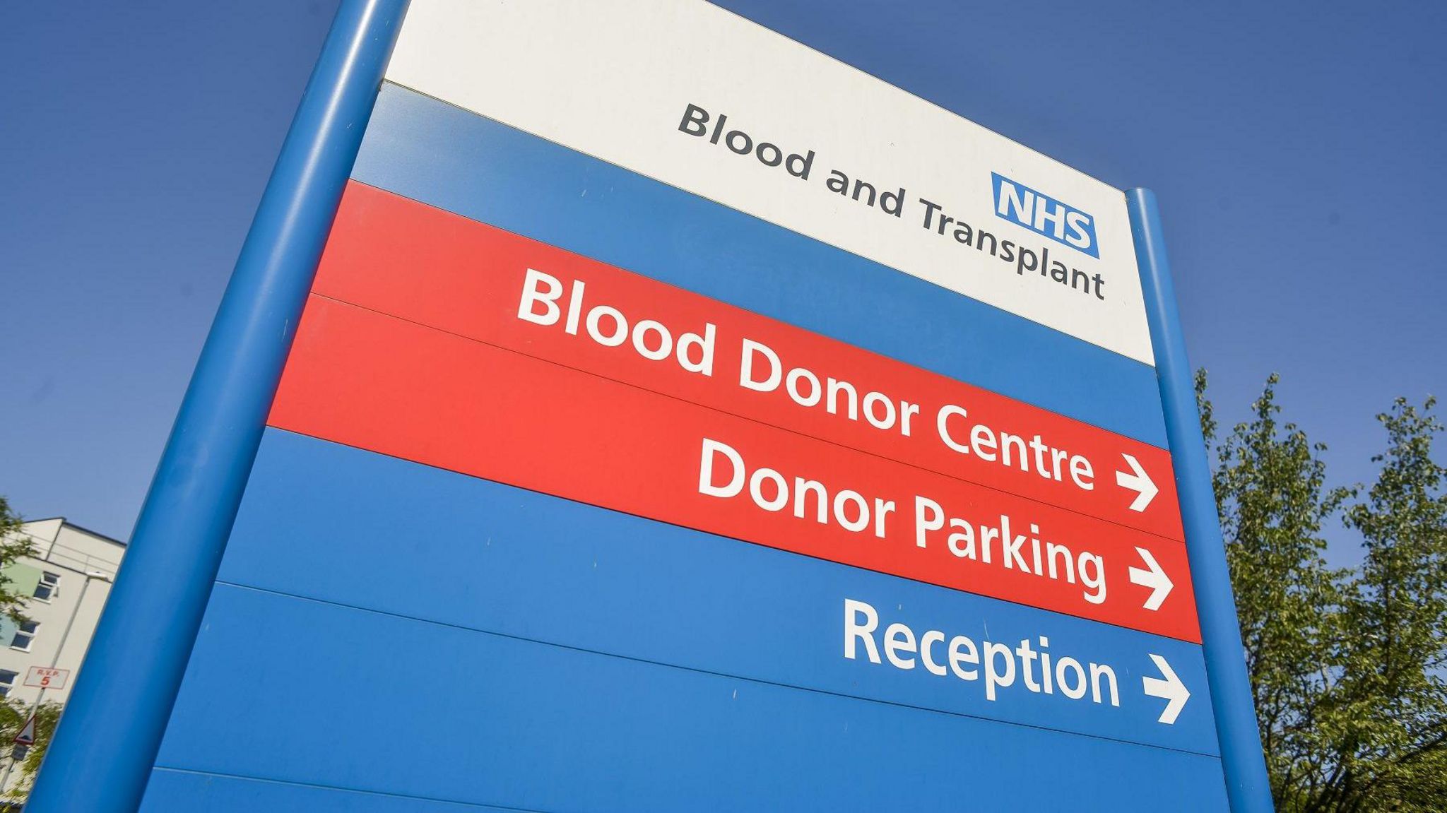 An NHS Blood and Transport sign
