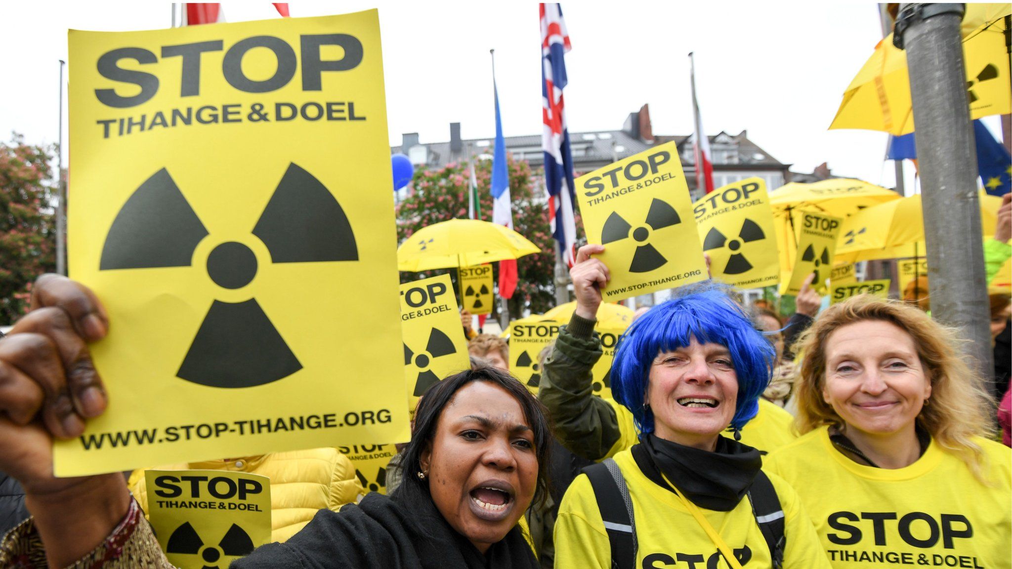 Anti-nuclear protesters hold banners and placards outside the city hall on May 10, 2018 in Aachen, western Germany.