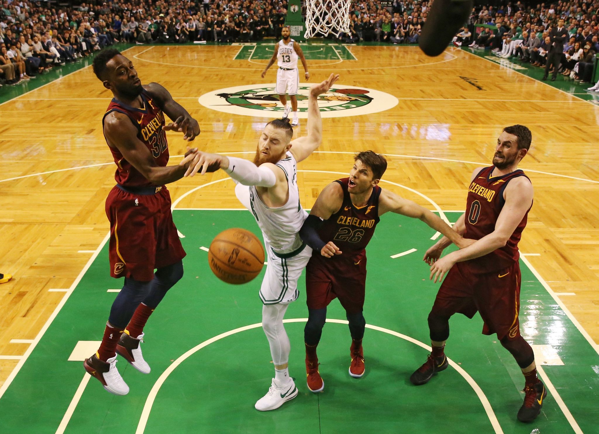 Jeff Green #32 of the Cleveland Cavaliers and Aron Baynes #46 of the Boston Celtics battle for the ball during the third quarter in Game One of the Eastern Conference Finals of the 2018 NBA Playoffs at TD Garden on May 13, 2018 in Boston, Massachusetts. The Boston Celtics defeated the Cleveland Cavaliers 108-83
