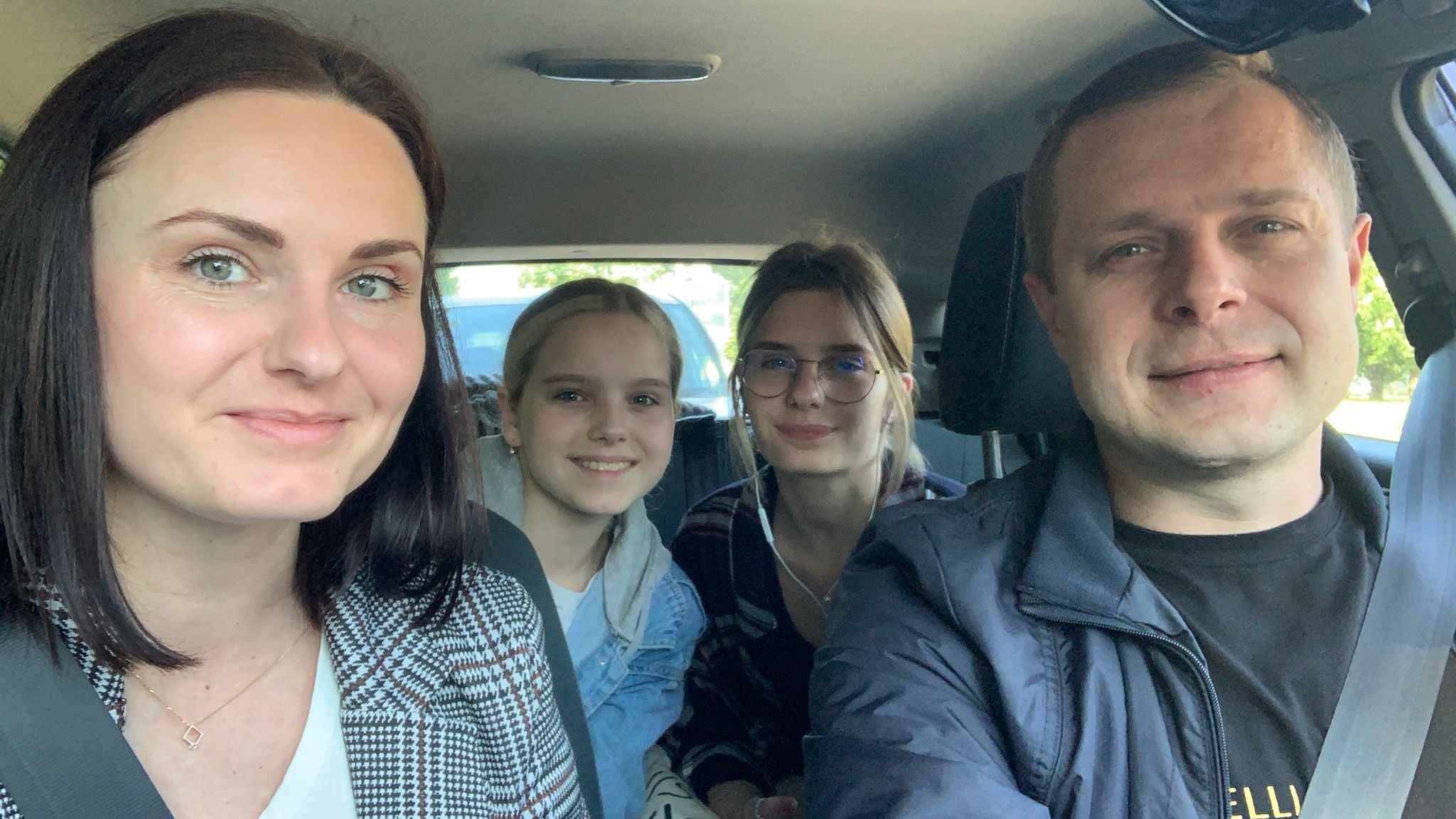 Iryna Orshak with her daughters and husband