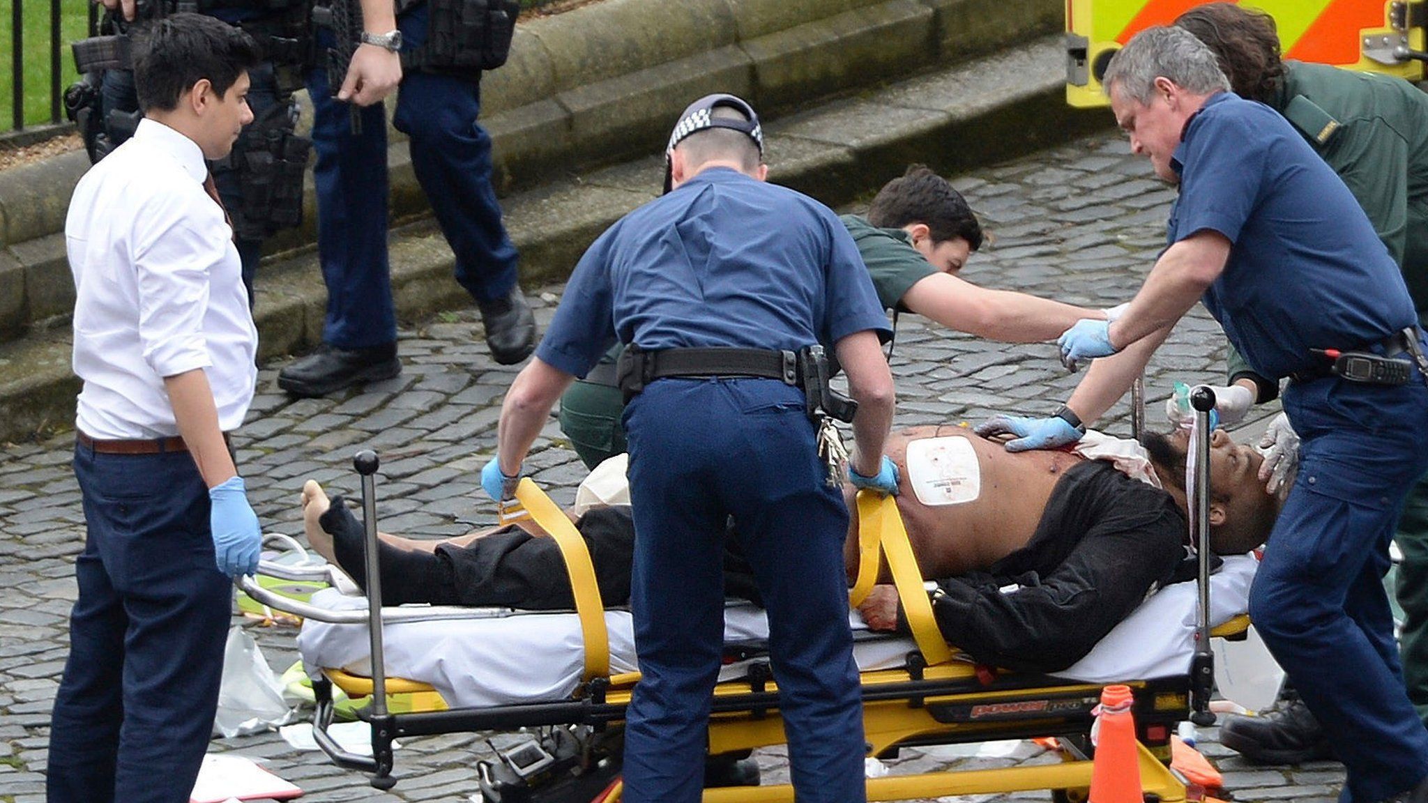 Khalid Massood being treated at the scene of the Westminster attack