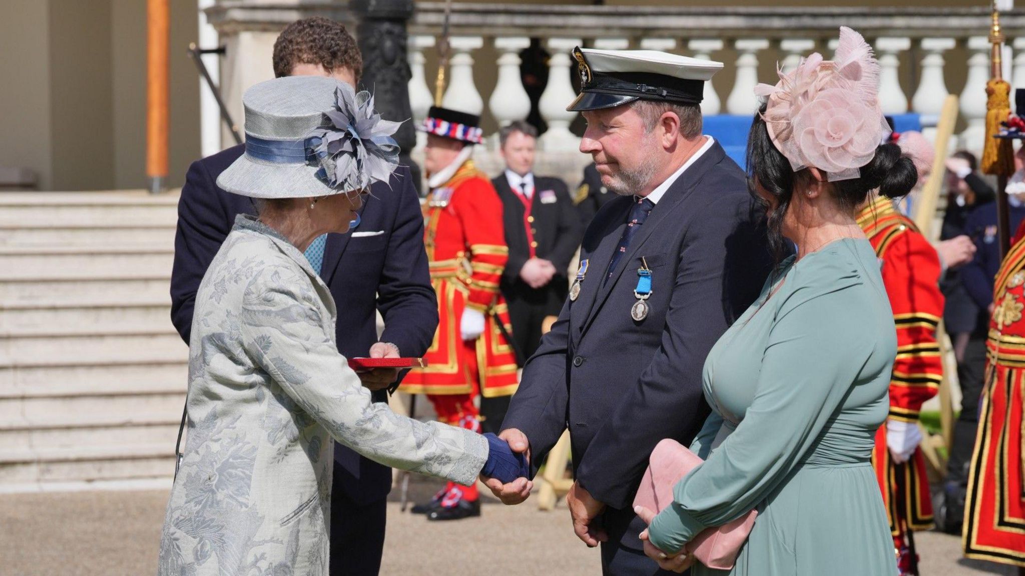 The Princess Royal pins a Silver Medal for Gallantry on Patch Harvey