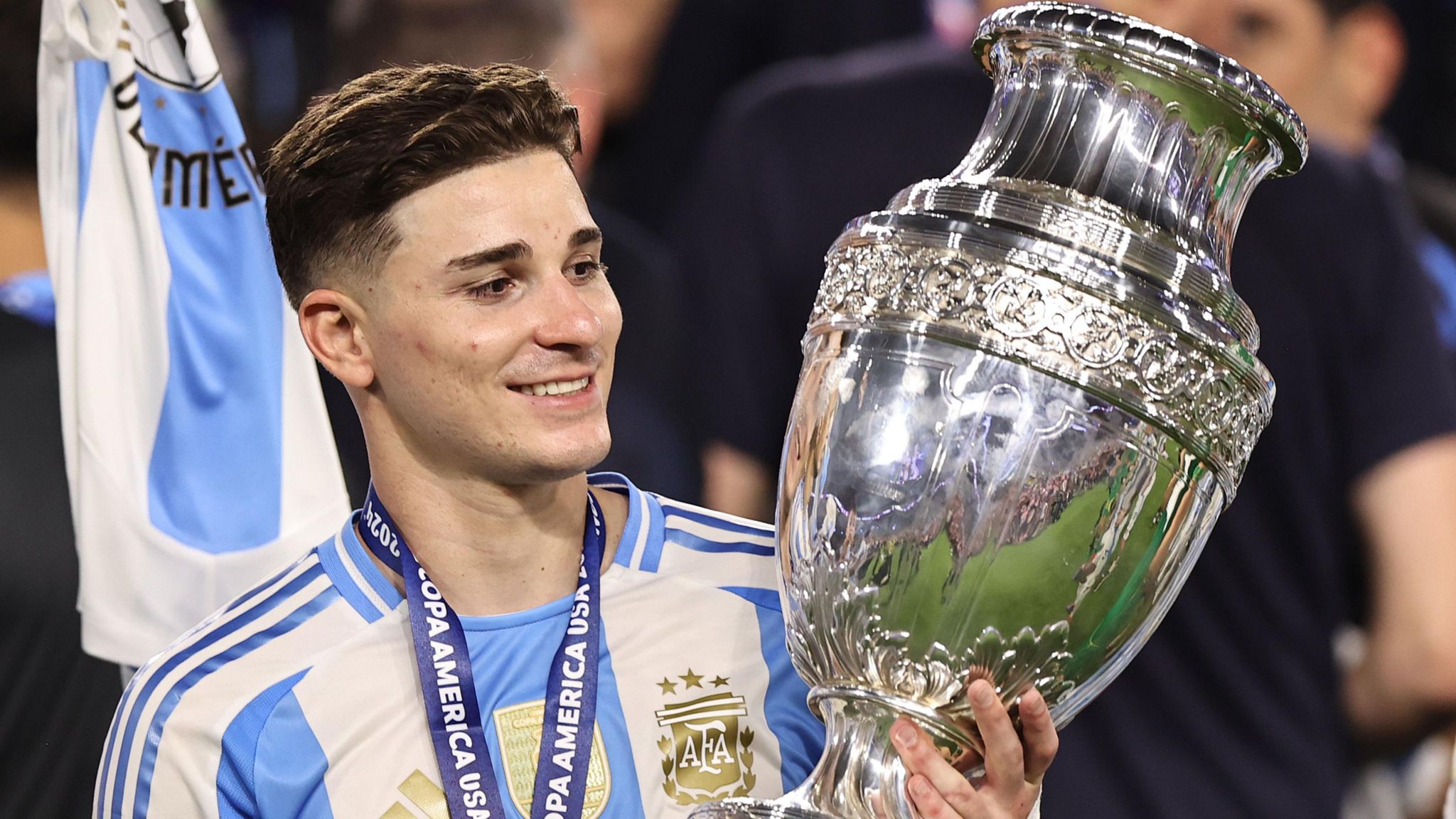 Julian Alvarez holds the Copa America trophy