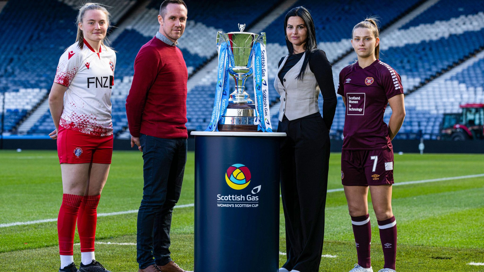 Robyn McCafferty, Jack Beesley, Eva Olid and Monica Forsyth with the women's Scottish Cup trophy