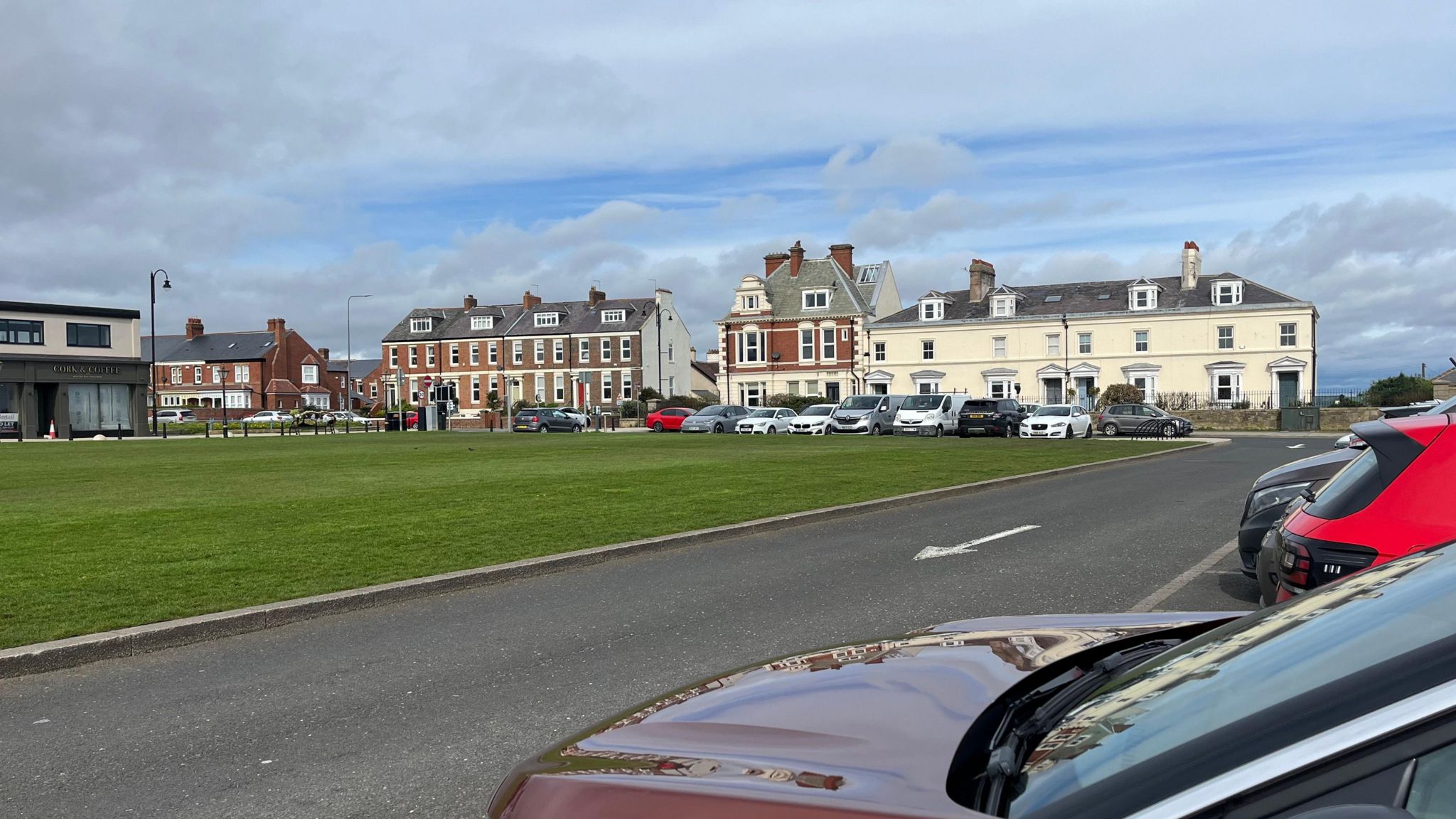 North Street in Seaham with cars parked in front of some posh houses 