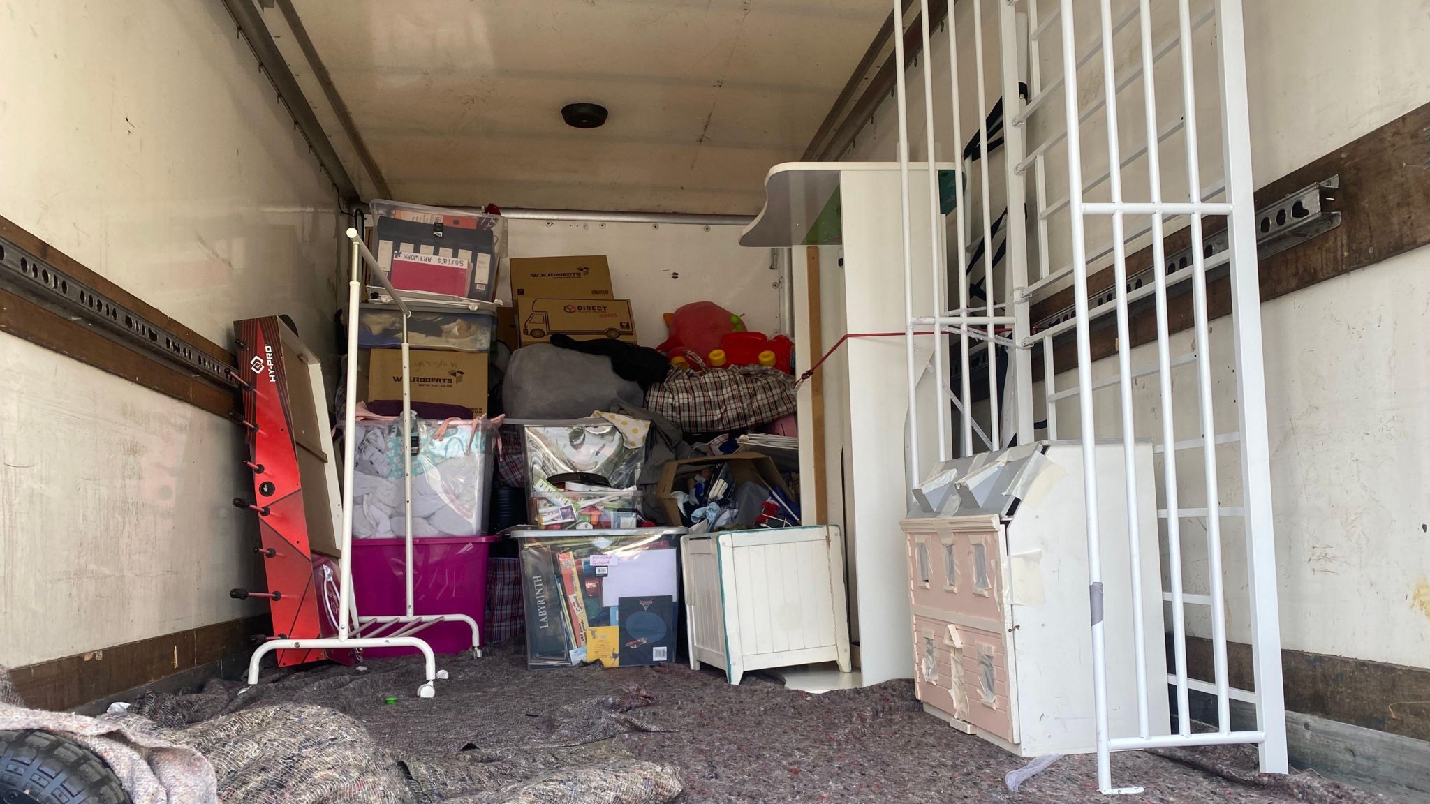 Carly's possessions packed into a van