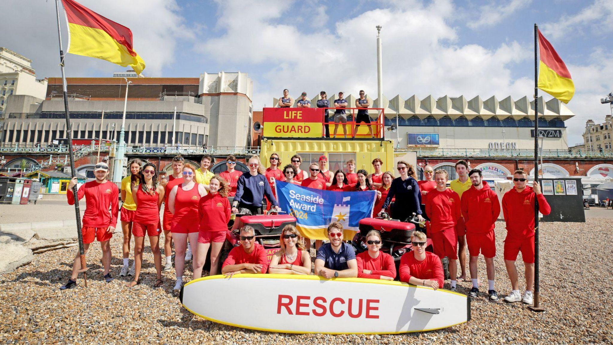 Brighton and Hove’s lifeguards stood on the beach in front of Pryzm nightclub, Brighton