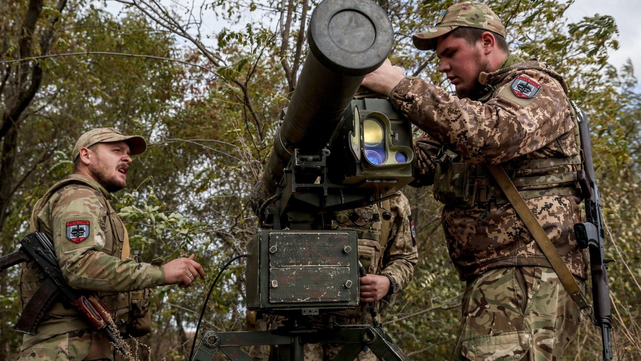 Ukrainian servicemen install a 'Skif' anti-tank guided missile (ATGM) system at an undisclosed location in the Zaporizhia region