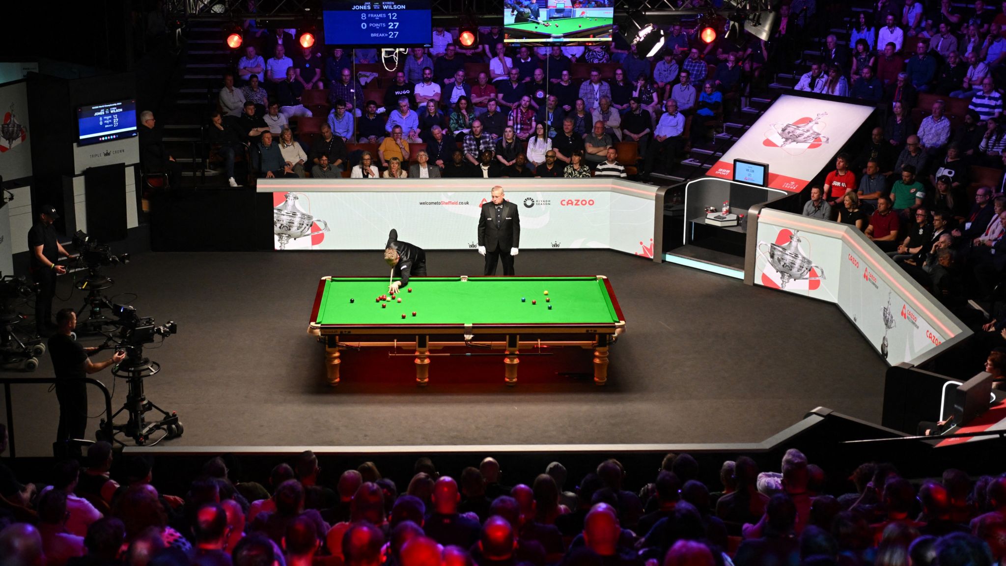 Kyren Wilson plays a shot during the 2024 World Championship Snooker final at The Crucible