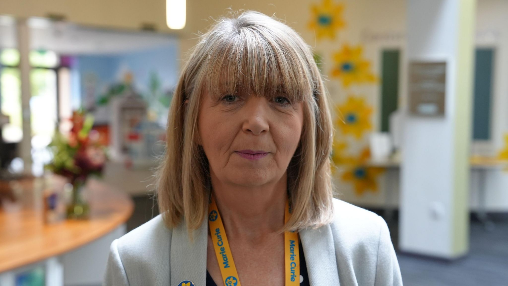 Susan Morgan in a Marie Curie Hospice. She is in focus and the background is blurred.