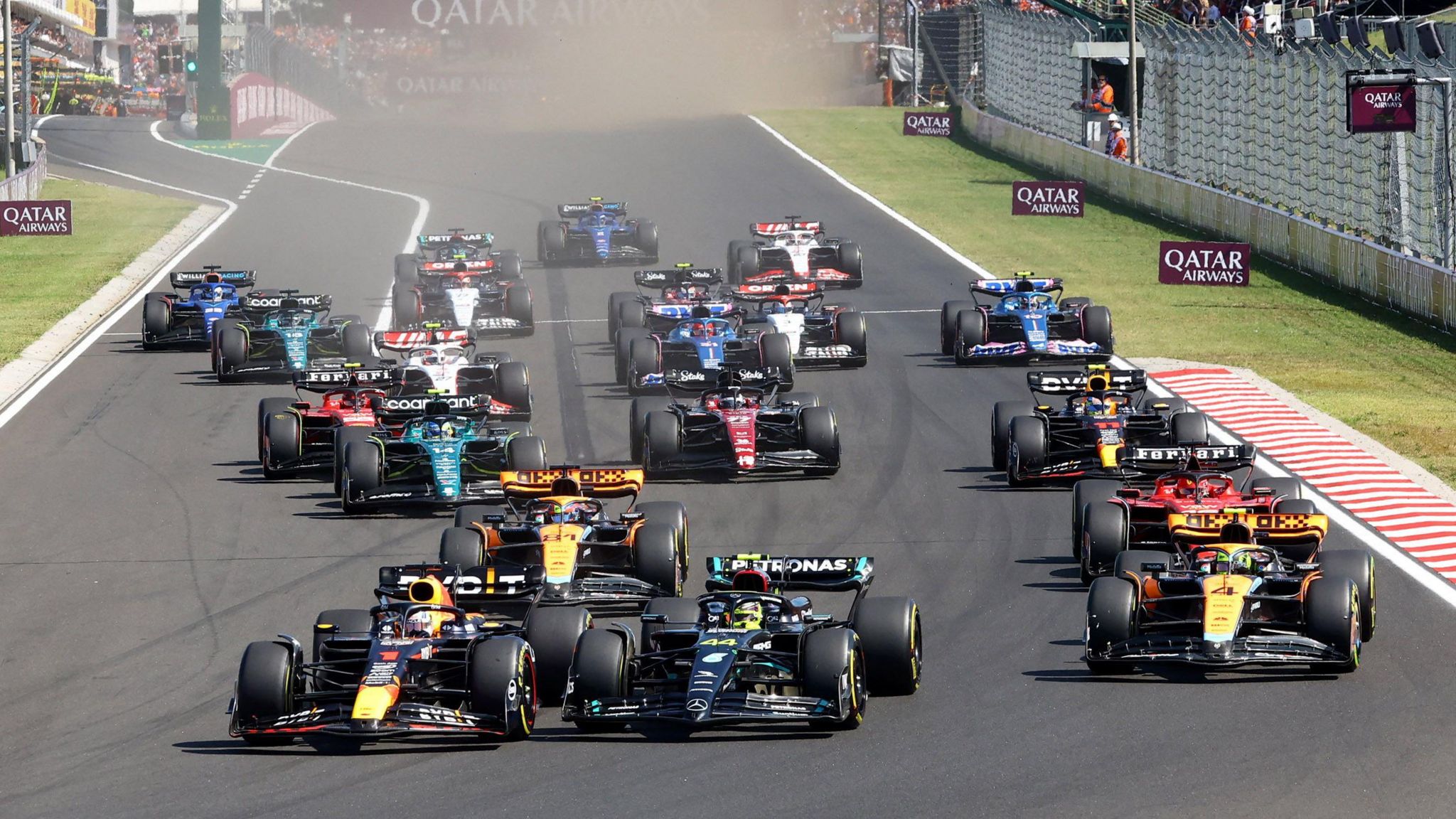 Max Verstappan and Lewis Hamilton contest the lead at the first corner of the 2023 Hungarian Grand Prix