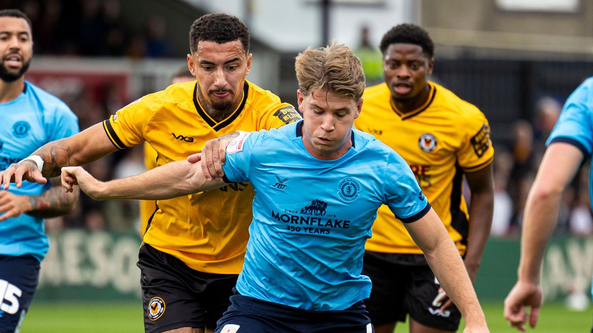 Courtney Baker-Richardson of Newport County in action against Max Sanders of Crewe Alexandra