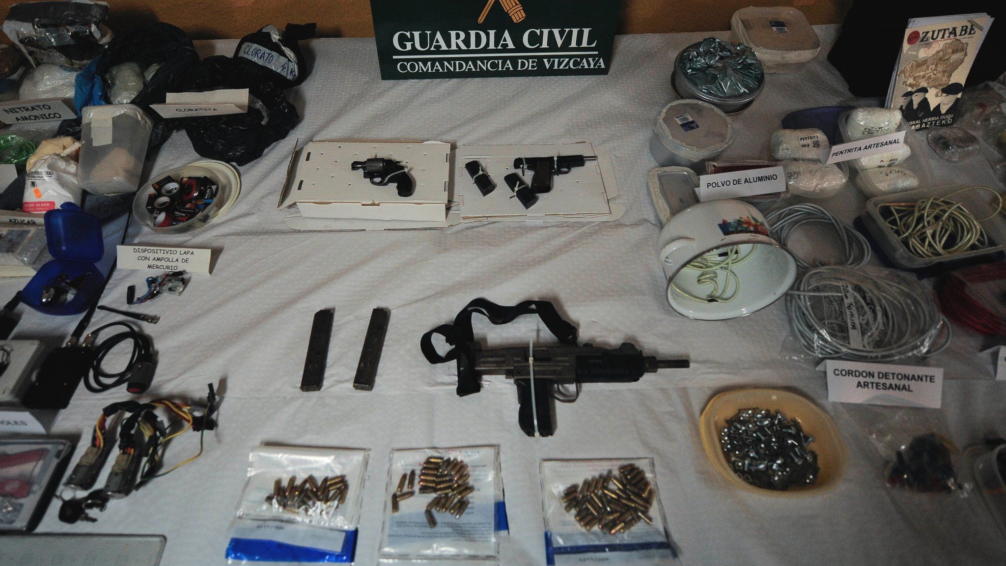 Munitions, weapons and 200 kilograms of explosives captured from the Basque separatist group Eta by the Civil Guard are displayed in Bilbao, northern Spain, on 11 March 2011