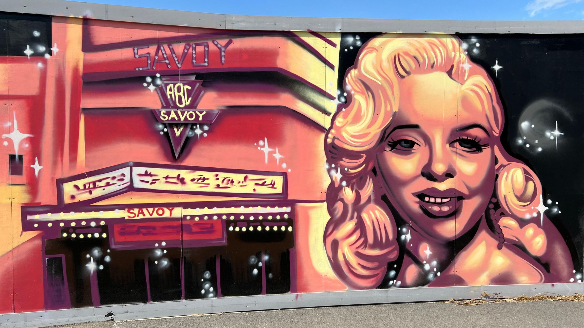 Street mural of Diana Dors in front of the 'ABC Savoy' theatre.