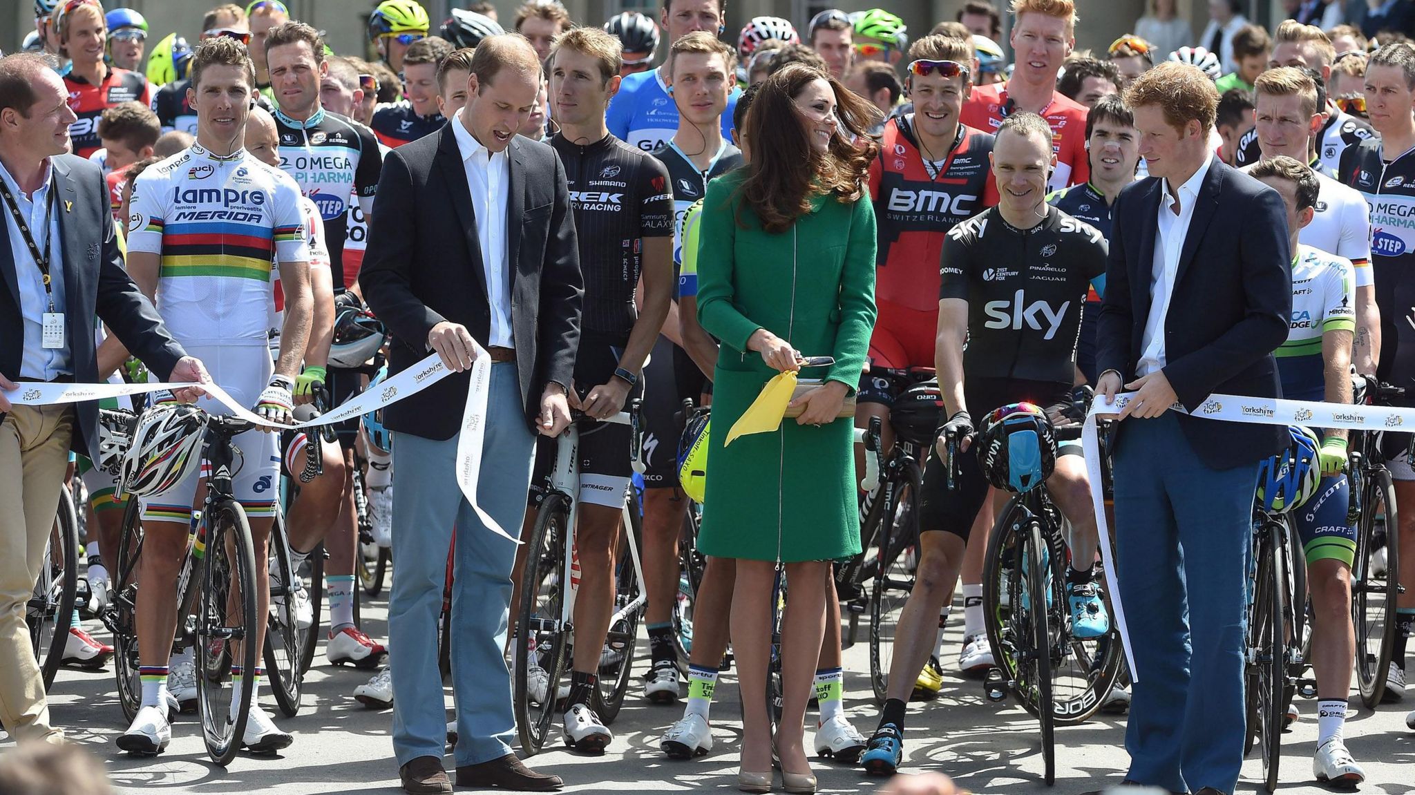 Prince William, Princess Kate and Prince Harry cut the starting tape at the 2014 Tour de France