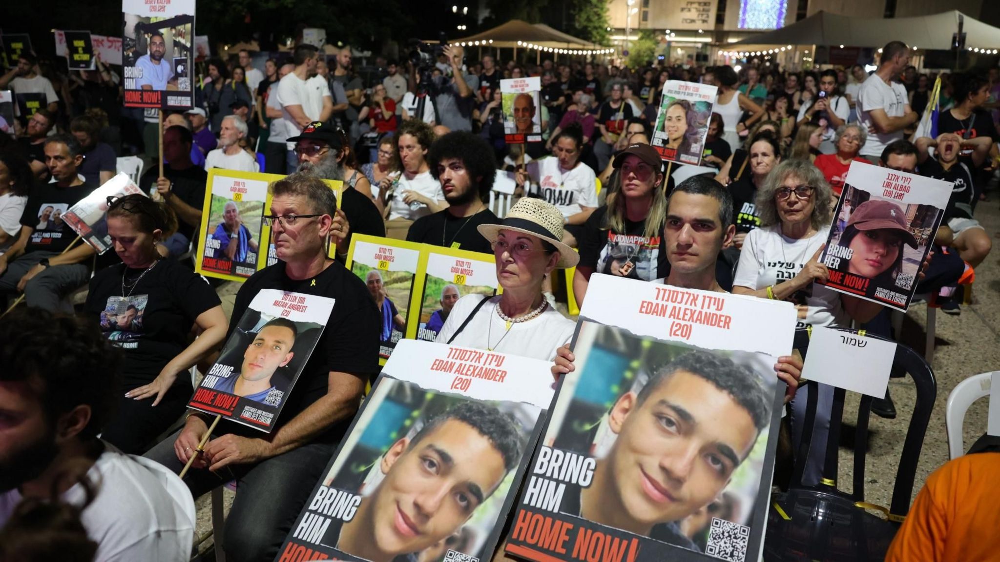 Israeli hostages' families watch Prime Minister Benjamin Netanyahu's address to the US Congress, on big screens at a square in central Tel Aviv, Israel (25 July 2024)