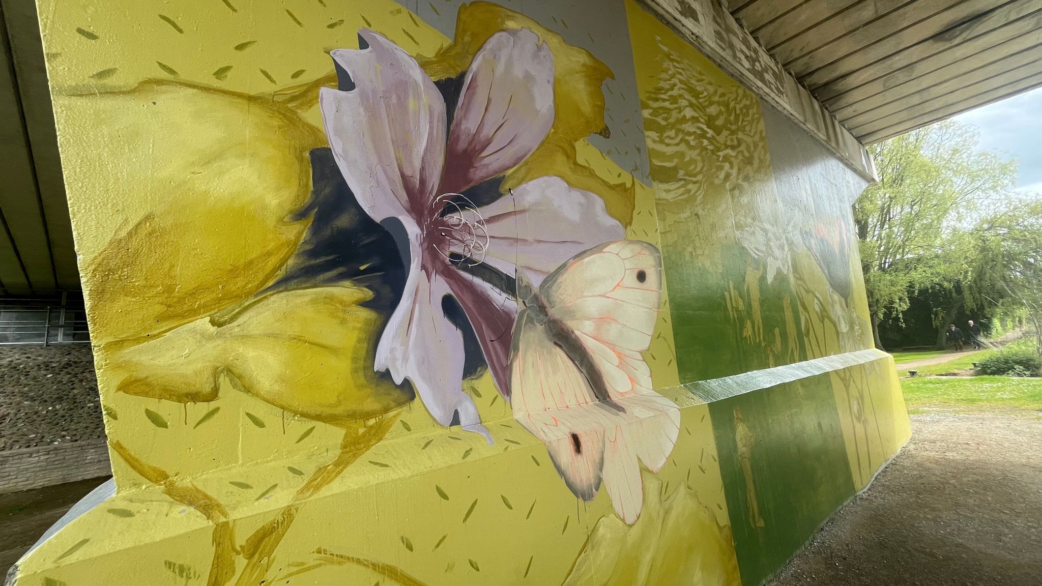 A flower painted on a giant mural