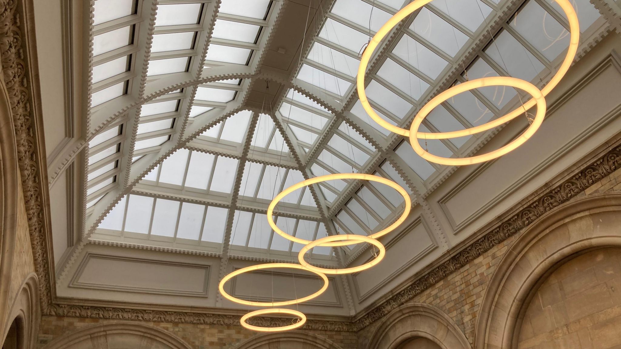 View of artistic lights in the shape of overlapping circles in the ceiling