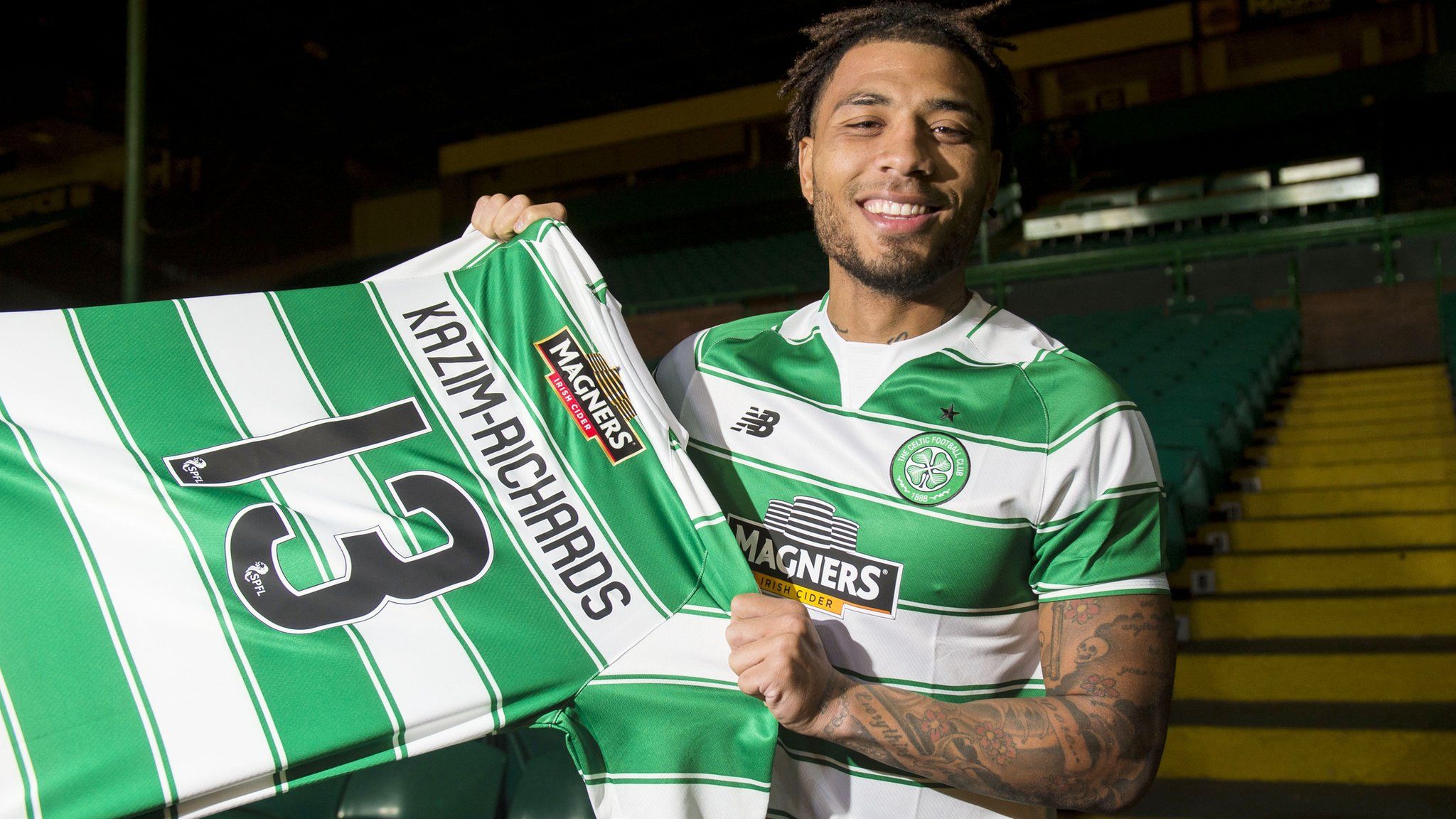 Colin Kazim-Richards shows off his new jersey